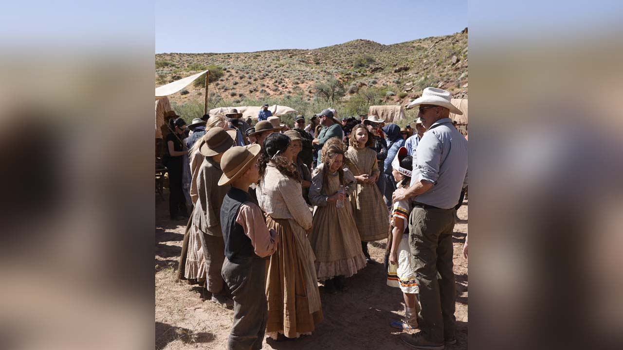 Ava Duran, Paiute Restoration Pow Wow Princess 2023-24, visits the film set on location for "Horizon: An American Saga 2," directed by Kevin Costner (right), Ivins, Utah.