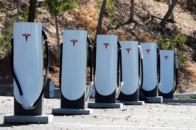 Tesla's electric-vehicle charging technology is being put on a fast track to become a U.S. standard, the automotive industry group of engineers that reviews standards said on Tuesday.
