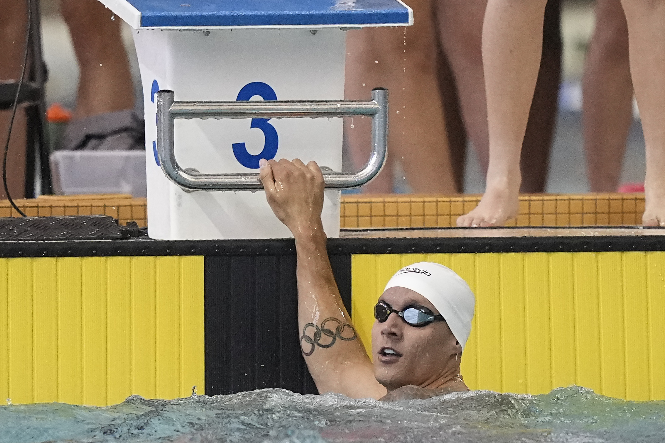 FILE - Caeleb Dressel looks up after swimming the men's 100 butterfly during the Speedo Atlanta Classic finals Friday, May 12, 2023, in Atlanta. Dressel finished 29th in the 100-meter freestyle at the U.S. nationals on Tuesday, June 27, falling far short of qualifying for the world championships in an event he won at the Tokyo Olympics. 