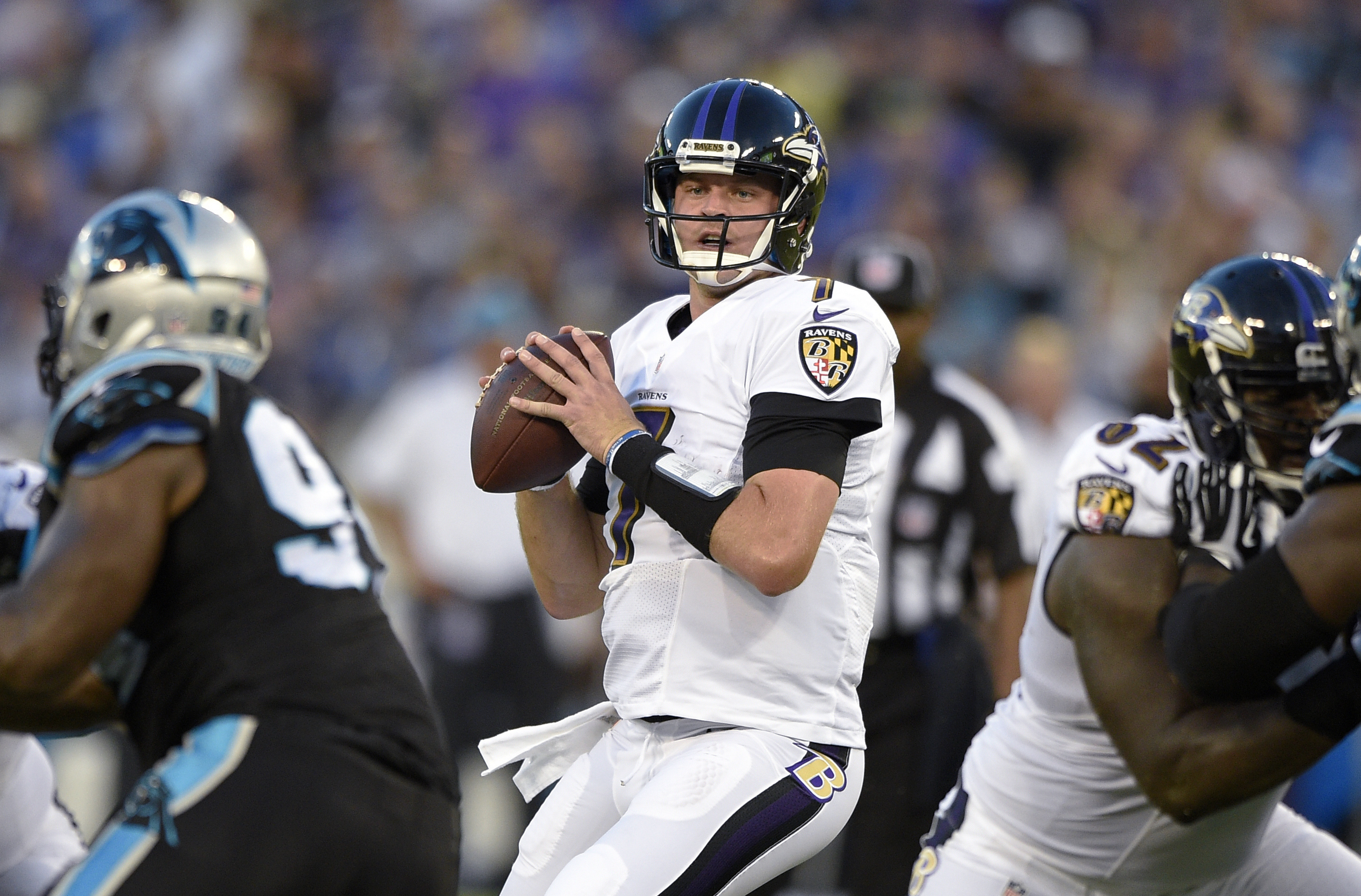FILE - Baltimore Ravens quarterback Ryan Mallett looks to pass during the first half of an NFL preseason football game against the Carolina Panthers, Aug. 11, 2016, in Baltimore. Mallett, who played for New England, Houston and Baltimore during five seasons in the NFL, has died. He was 35. Mallett died in an apparent drowning, according to the Okaloosa County Sheriff’s Office. Mallett was a football coach at White Hall High School in his native Arkansas, and the school district also confirmed his death in a post on its website.
