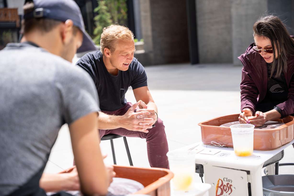 Kreative Kiln owner Tyler Nyland teaches customers how to make pottery. Experience-based businesses like the Kreative Kiln, in Pleasant Grove, are becoming popular in Utah.