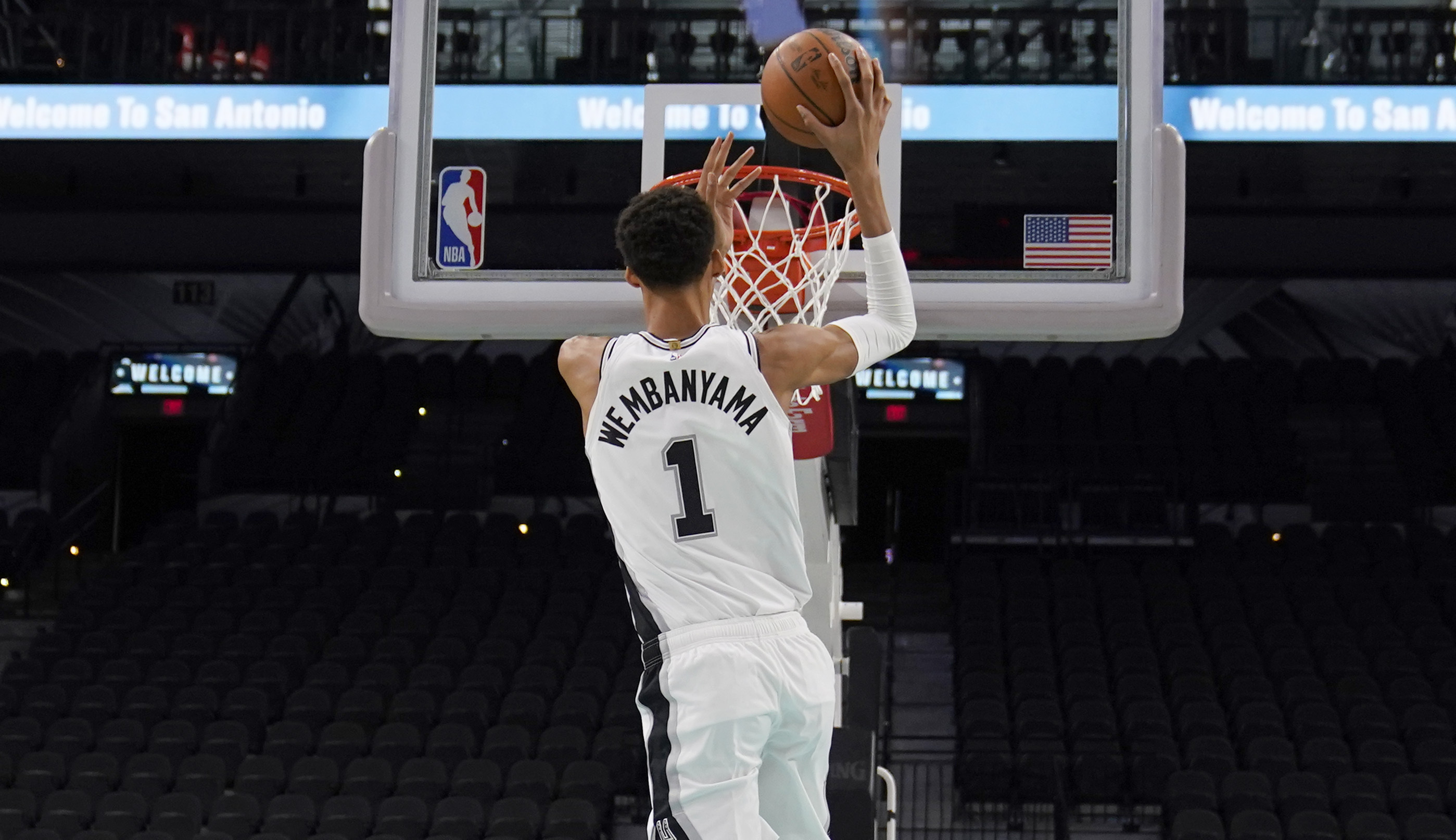 San Antonio Spurs' Victor Wembanyama, the No. 1 draft pick, shoots during an NBA basketball press conference, Saturday, June 24, 2023, at the AT&T Center in San Antonio.