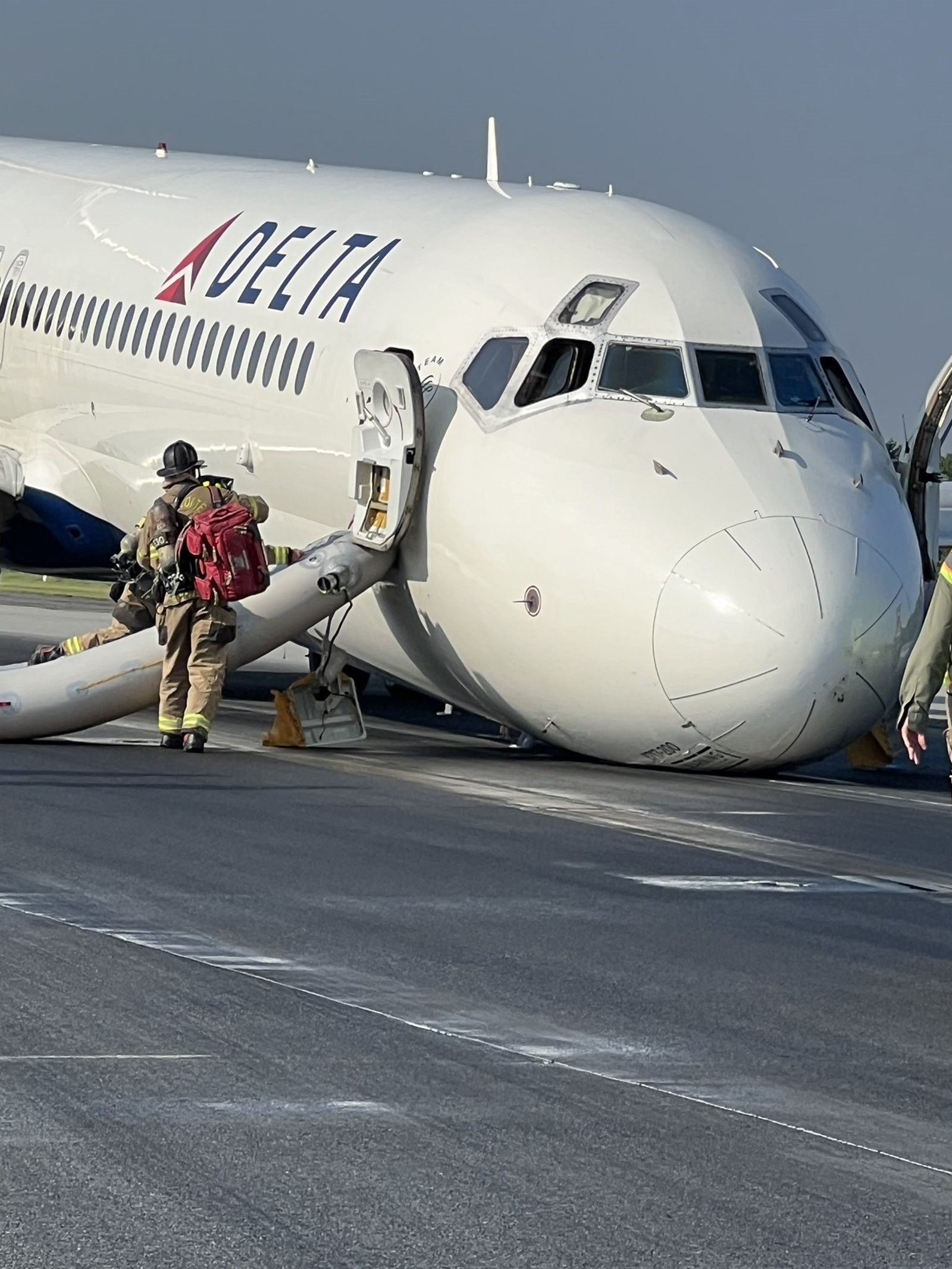 A Delta Air Lines flight landed with its "nose landing gear up" at Charlotte Douglas International Airport in North Carolina on Wednesday morning, the Federal Aviation Administration says.