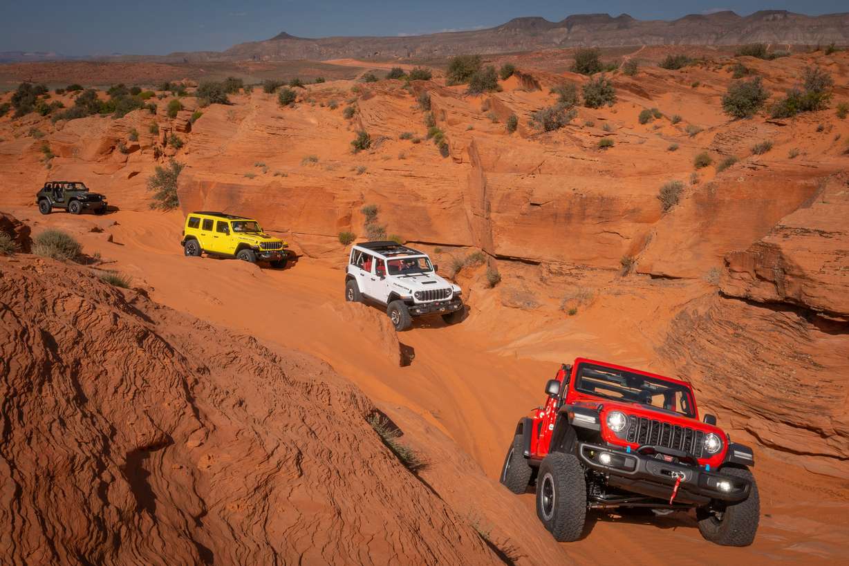 2024 Jeep® Wrangler lineup (front to back): Wrangler Rubicon 4xe with JPP 2-inch lift kit, Wrangler Rubicon 392, Wrangler Rubicon X 4xe and Wrangler Willys 2-door