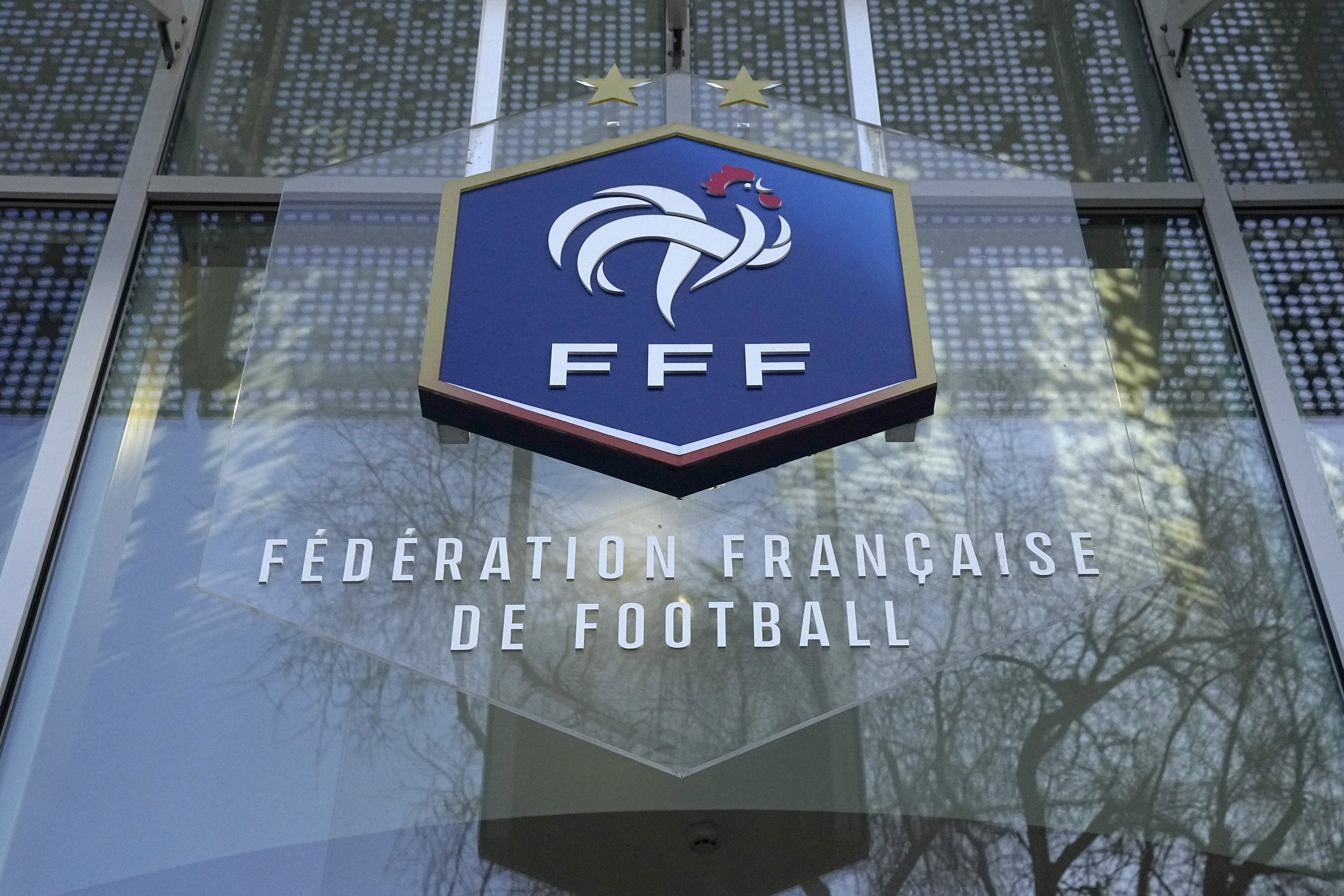 FILE - The logo of the French soccer federation (FFF), is pictured at the federation headquarters, Wednesday, Jan. 11, 2023 in Paris. France’s highest administrative jurisdiction said Thursday, June 29, 2023 the country's soccer federation is entitled to ban headscarves in matches. 