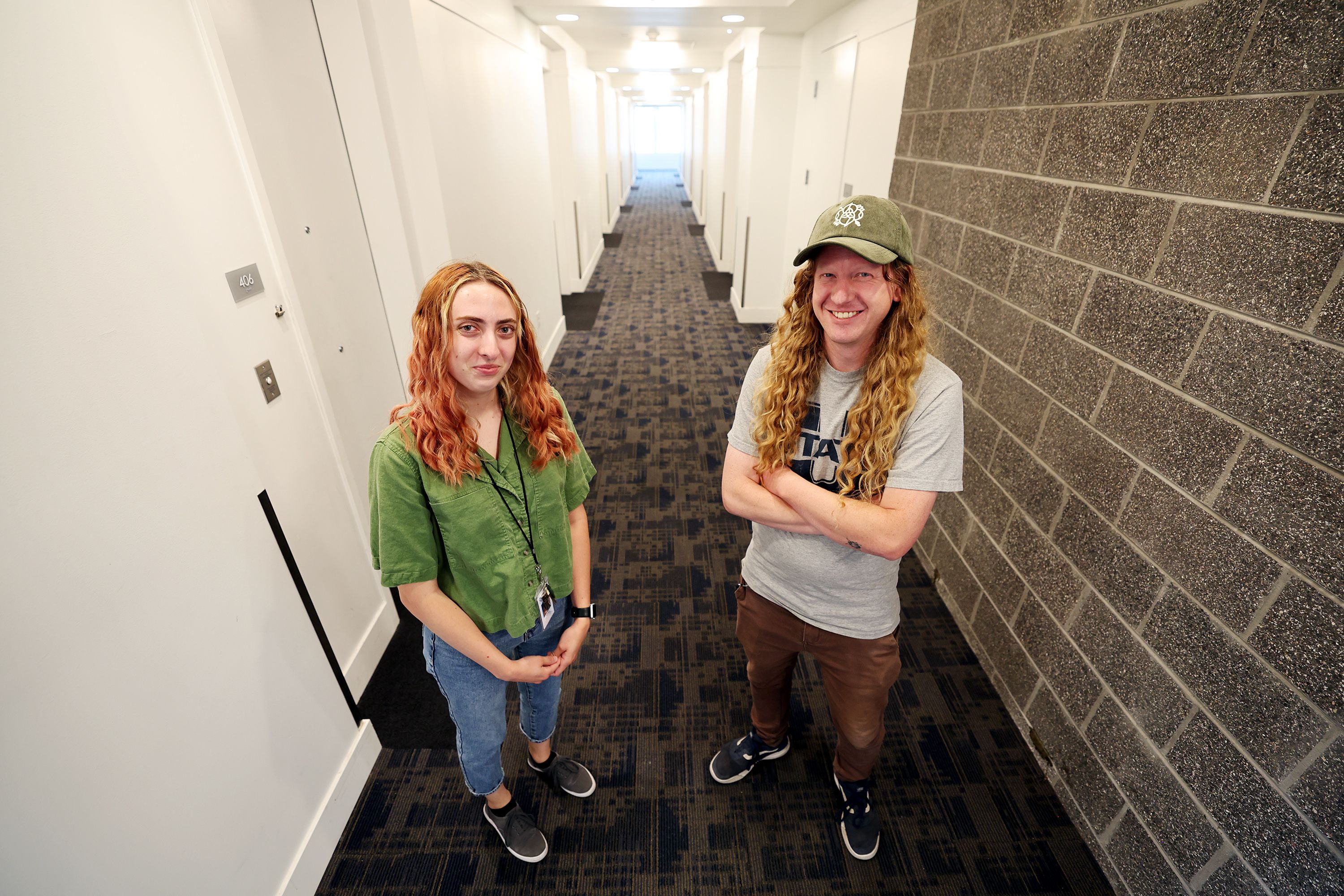 Caseworker Abby Coleman and service supervisor Tyler Greer pose for photos at the Magnolia building, a Road Home facility in Salt Lake City, on Wednesday. Utah is making headway in developing deeply affordable housing, according to a new state report on homelessness.