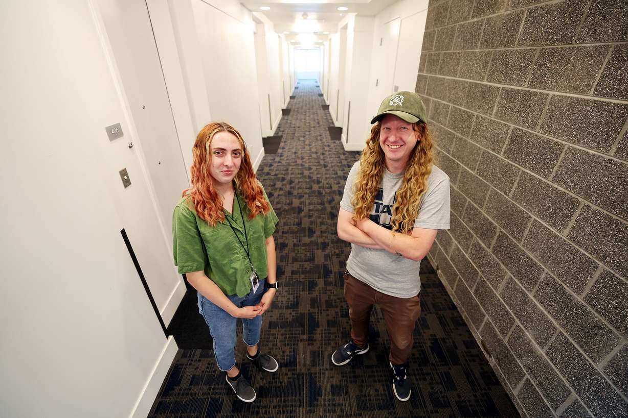 Caseworker Abby Coleman and service supervisor Tyler Greer pose for photos at the Magnolia building, a Road Home facility in Salt Lake City, on Wednesday. Utah is making headway in developing deeply affordable housing, according to a new state report on homelessness.