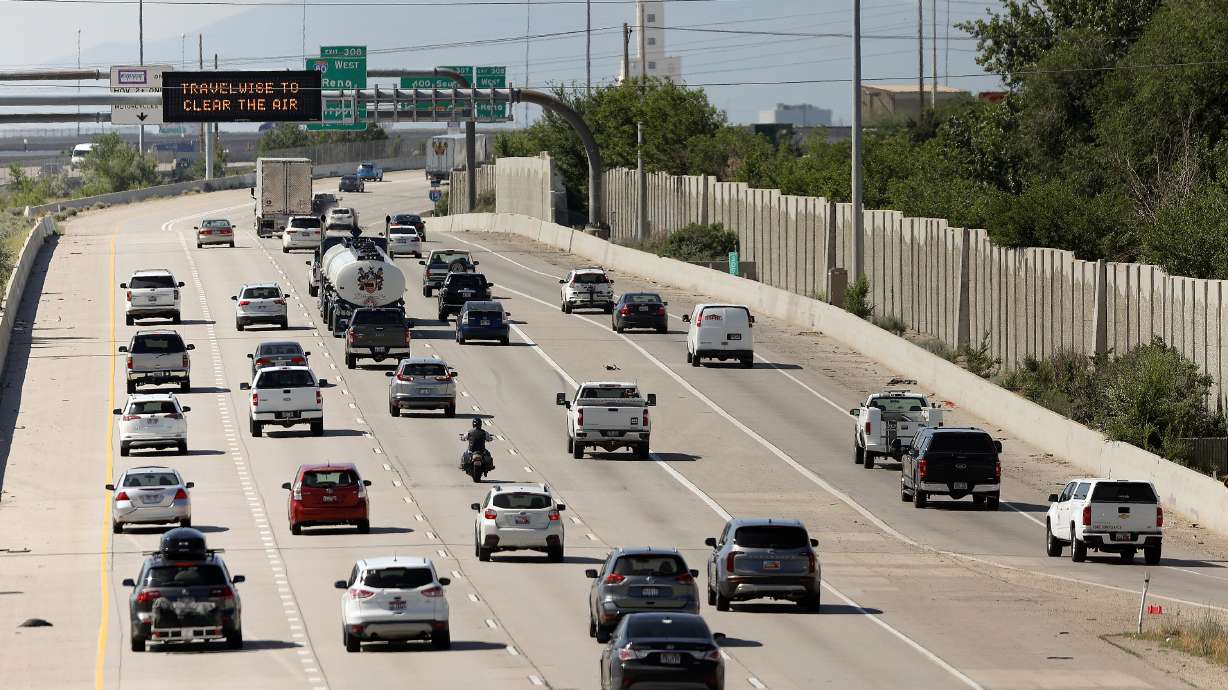 Vehicles travel on I-15 in Salt Lake City on June 16. Utah Department of Transportation officials say delays are possible ahead of July 4, but holiday travel may be spread out.