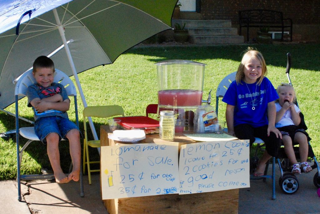 Emmett and Lydia Riding put on their first charity lemonade stand which benefited children in Haiti, St. George, Utah, in June 2013.