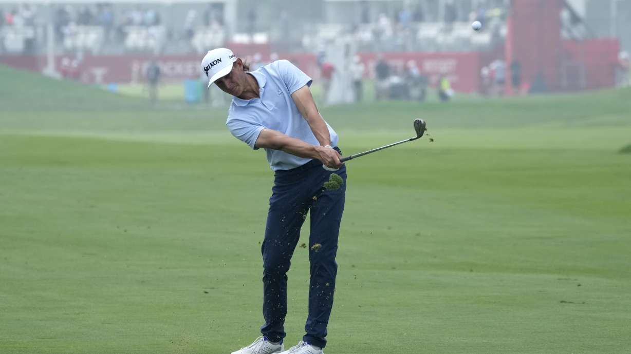 Peter Kuest hits his approach shot onto the 18th green during the first round of the Rocket Mortgage Classic golf tournament at Detroit Country Club, Thursday, June 29, 2023, in Detroit.
