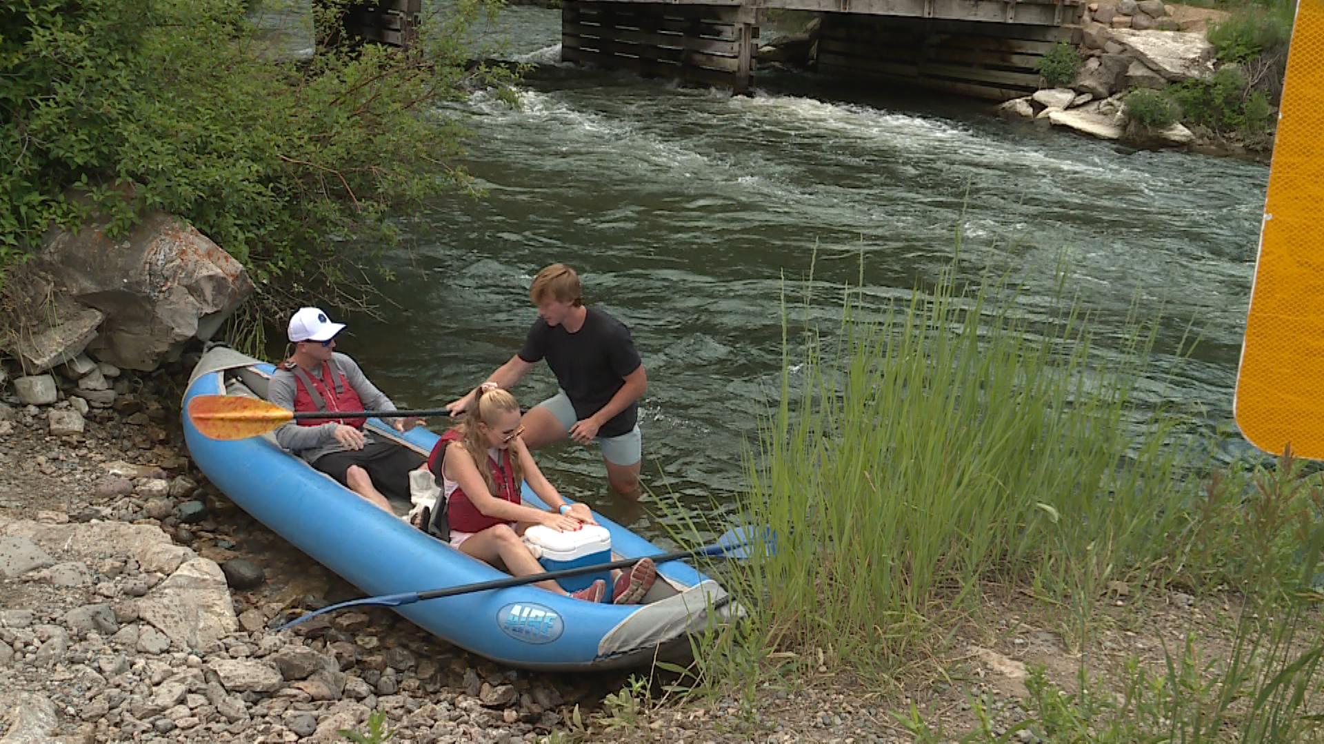 River guides and floaters getting ready to go back into the waters of the Provo River Thursday.