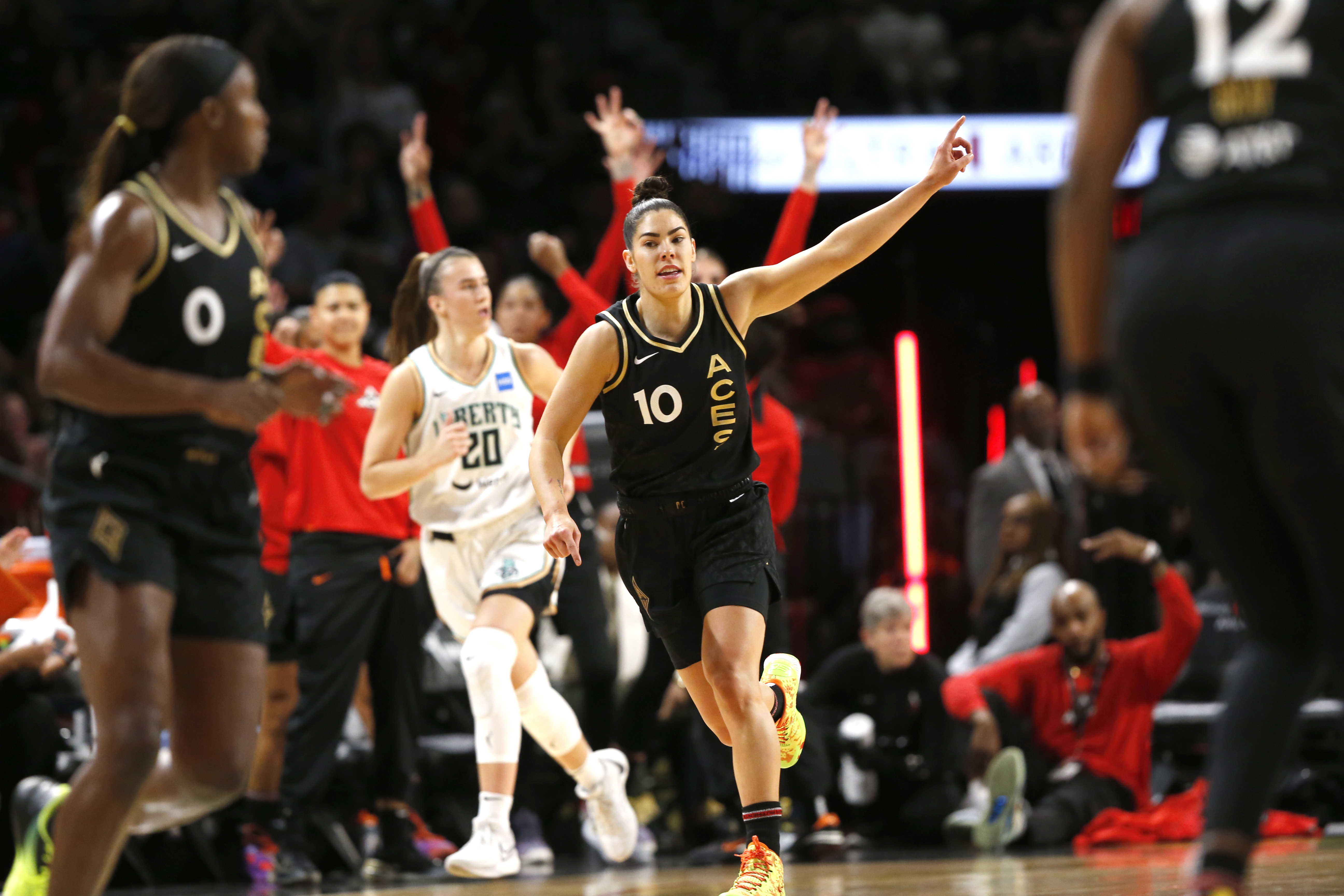 Las Vegas Aces guard Kelsey Plum (10) celebrates a 3-point basket against the New York Liberty during the first half of a WNBA basketball game Thursday, June 29, 2023, in Las Vegas. 