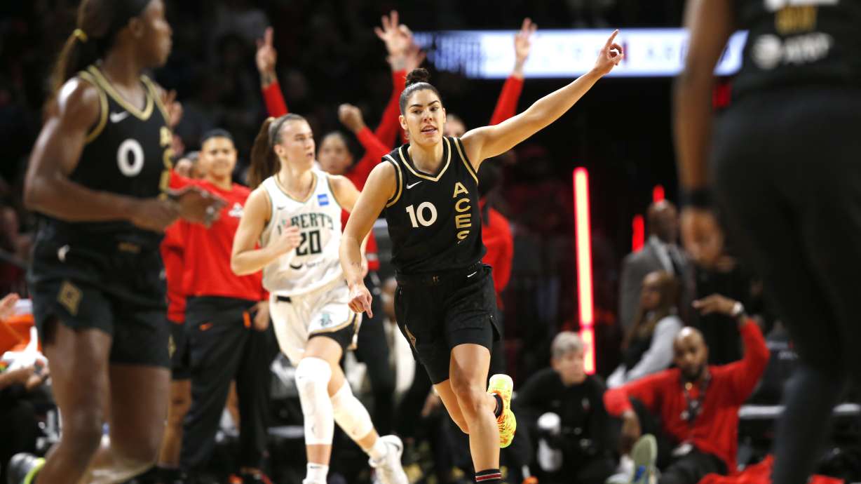 Las Vegas Aces guard Kelsey Plum (10) celebrates a 3-point basket against the New York Liberty during the first half of a WNBA basketball game Thursday, June 29, 2023, in Las Vegas.