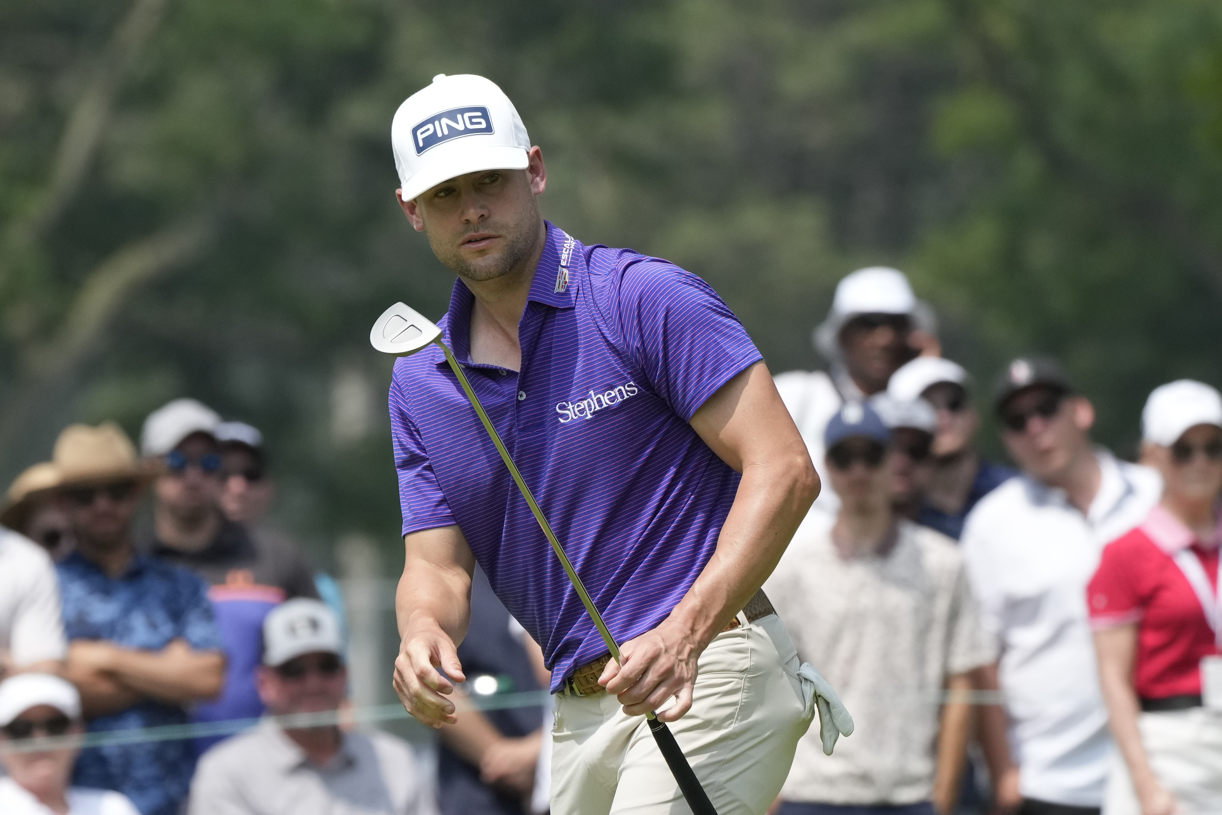 Taylor Moore eyes his putt on the ninth green during the second round of the Rocket Mortgage Classic golf tournament at Detroit Country Club, Friday, June 30, 2023, in Detroit. 