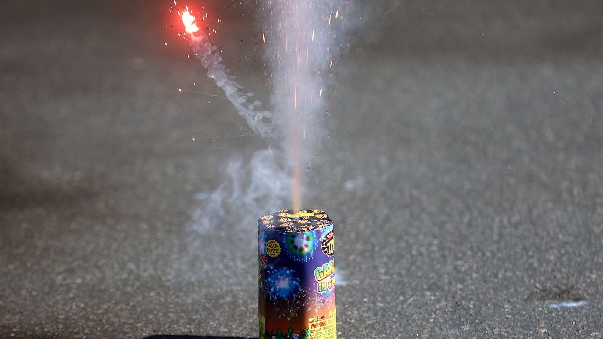 Fireworks go off during a demonstration on how to safely light and extinguish fireworks at Macey’s Grocery Store in Murray on July 21, 2022. The lighting of fireworks is legal in Utah between July 2 and July 5, and July 22 and July 25 in Utah.