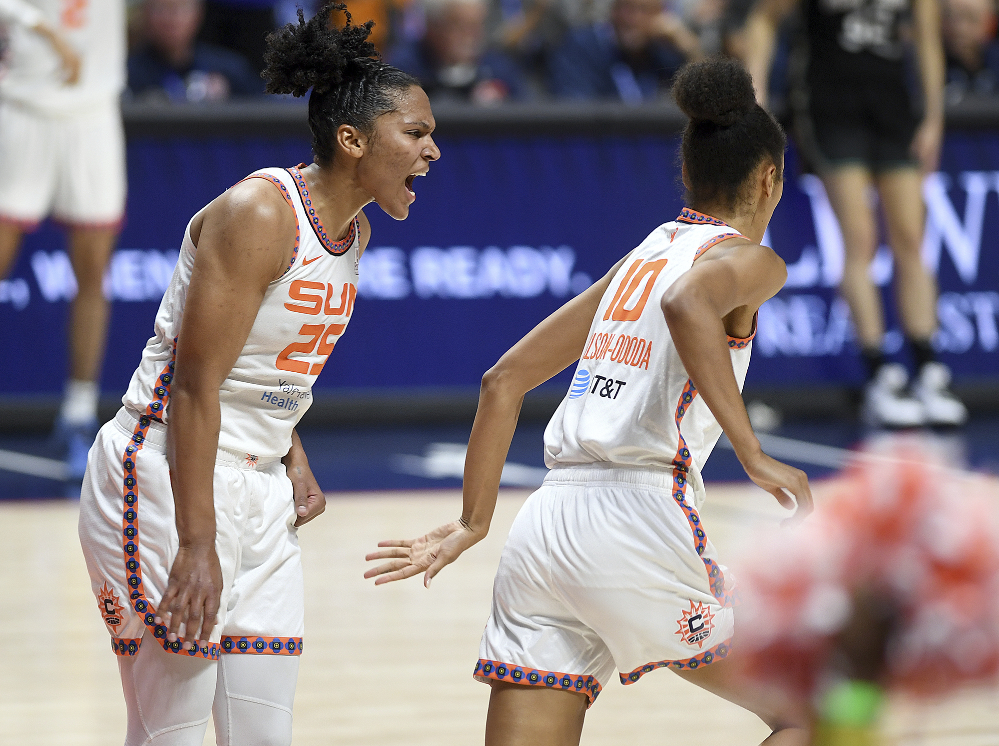 Connecticut Sun's Alyssa Thomas (25) celebrates a basket against the New York Liberty with Olivia Nelson-Ododa (10) during the first half of a WNBA basketball game Tuesday, June 27, 2023, in Uncasville, Conn. 