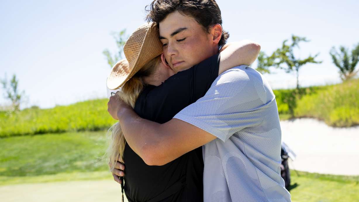 Simon Kwon hugs his mother, Casi Kwon, after winning in the final round of the 125th Utah State Amateur Championship at the Salt Lake Country Club in Salt Lake City on Saturday, July 1, 2023.