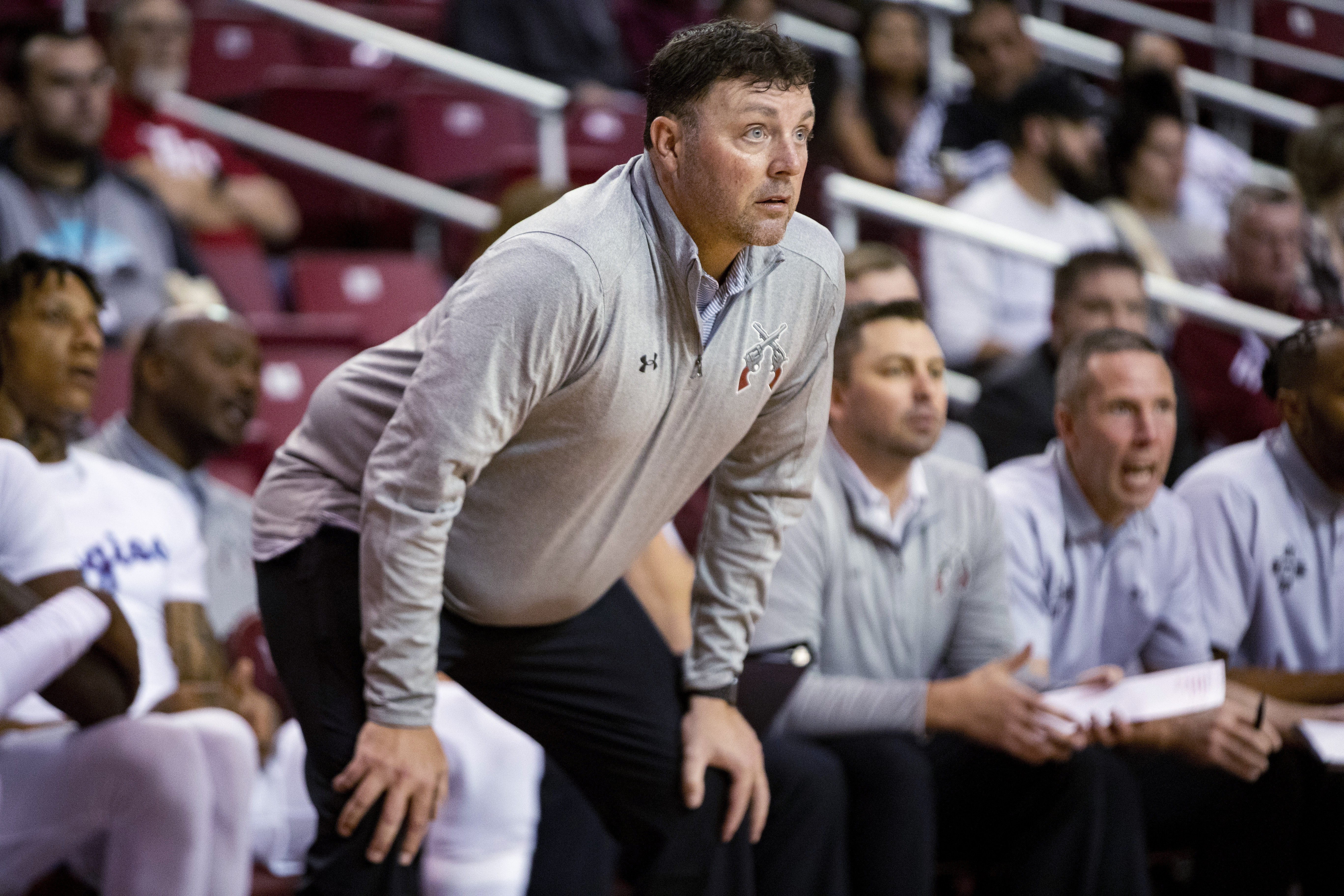 FILE - New Mexico State coach Greg Heiar watches players during a game Nov. 2, 2022, in Las Cruces, N.M. Heiar has been hired as the head coach at Mineral Area College, a junior college in central Missouri. Heiar was dismissed from New Mexico State in February in the wake of hazing allegations within the team that shut down the program for the season. 