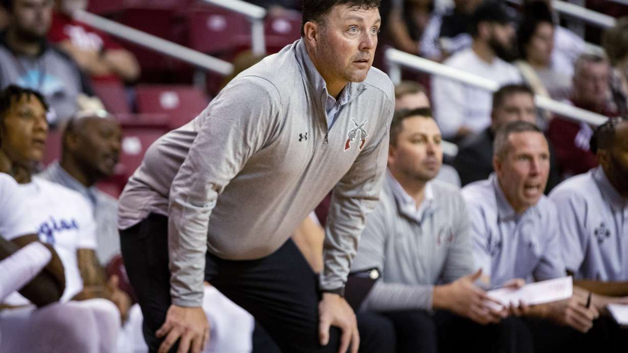 FILE - New Mexico State coach Greg Heiar watches players during a game Nov. 2, 2022, in Las Cruces, N.M. Heiar has been hired as the head coach at Mineral Area College, a junior college in central Missouri. Heiar was dismissed from New Mexico State in February in the wake of hazing allegations within the team that shut down the program for the season.