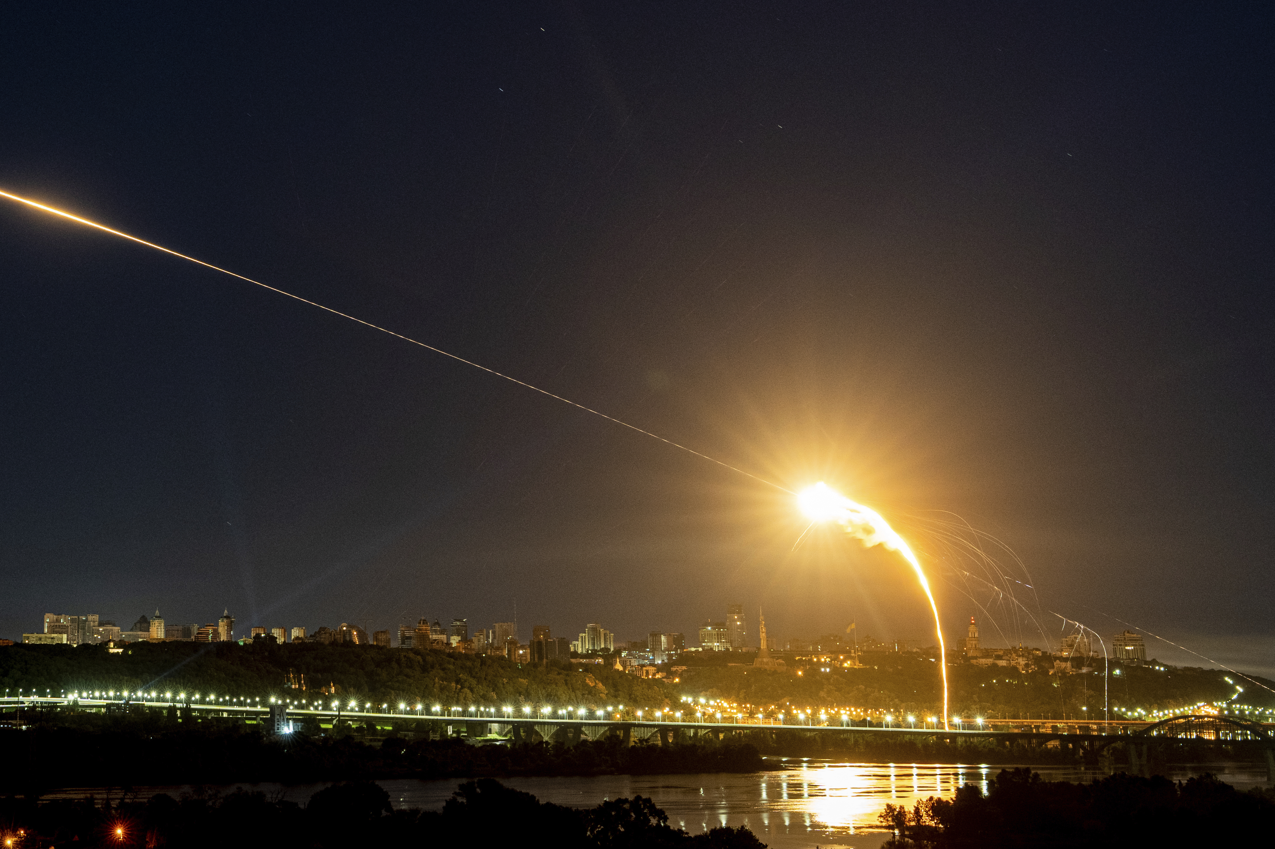 Ukrainian air defense intercepts a Shahed drone mid-air in the third Russia aerial attack on the capital within 24 hours in Kyiv, Ukraine, on May 30,