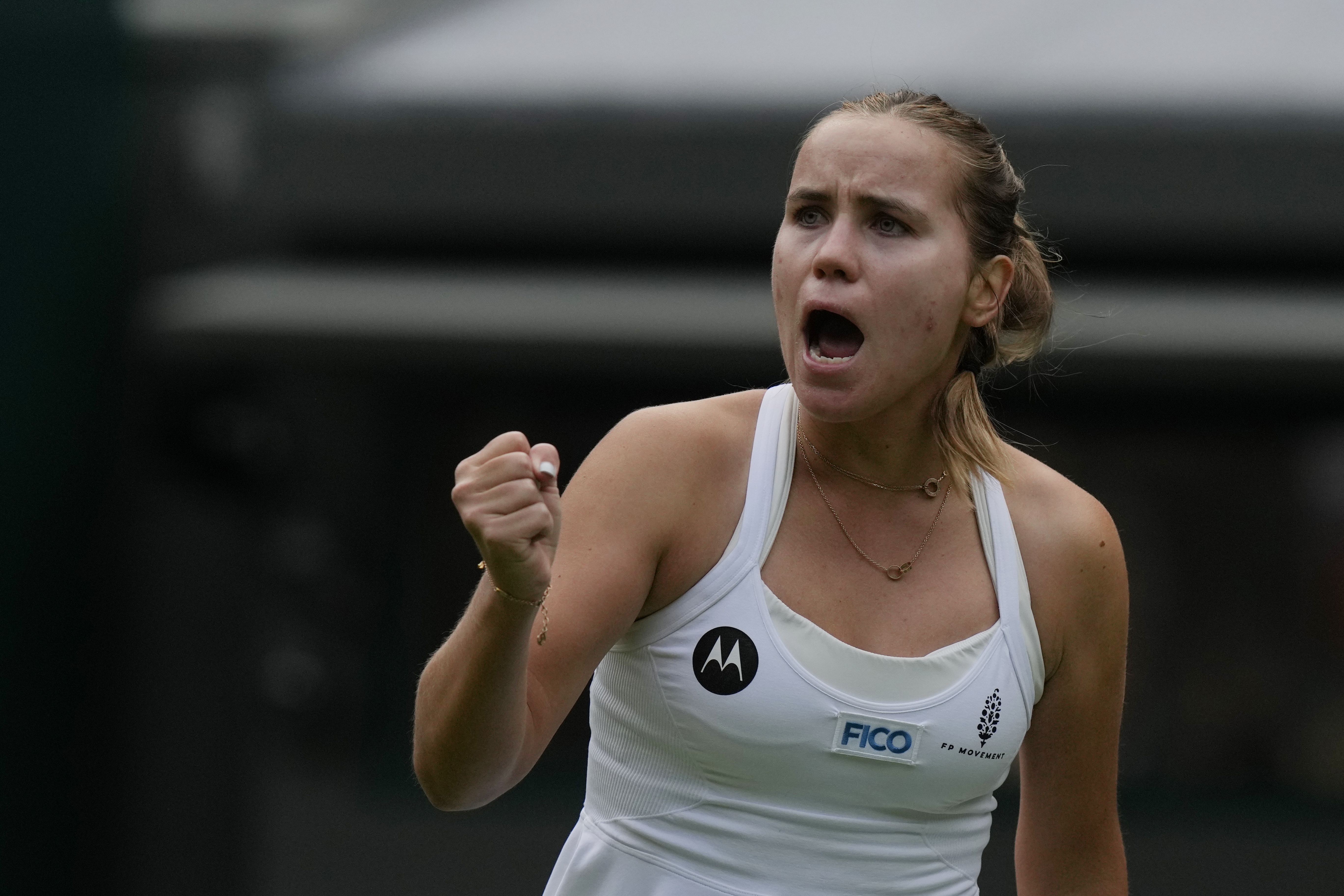 Sofia Kenin of the US celebrates winning a point from Coco Gauff of the US during the first round women's singles match on day one of the Wimbledon tennis championships in London, Monday, July 3, 2023. 