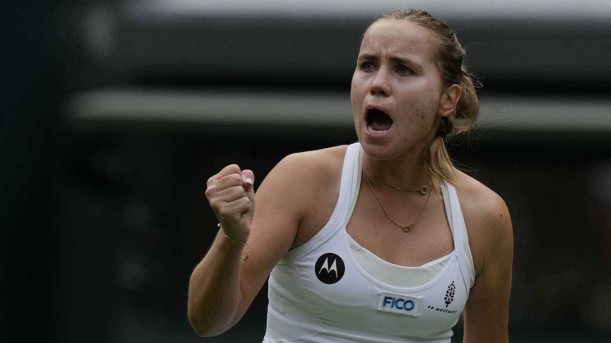 Sofia Kenin of the US celebrates winning a point from Coco Gauff of the US during the first round women's singles match on day one of the Wimbledon tennis championships in London, Monday, July 3, 2023.