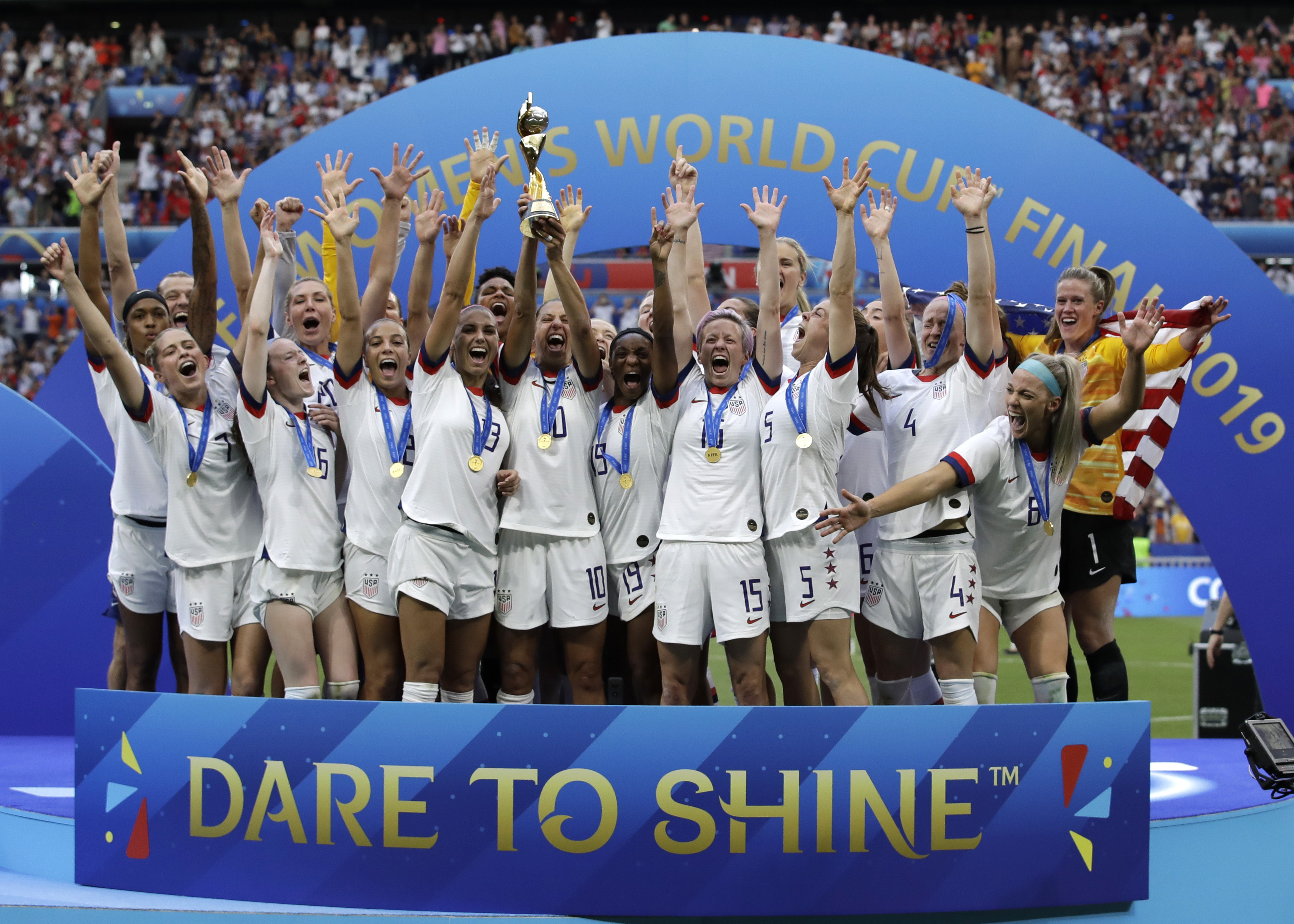 FILE - Team USA celebrates after winning the Women's World Cup soccer final against the Netherlands at the Stade de Lyon in Decines, outside Lyon, France, Sunday, July 7, 2019. The United States will be playing for an unprecedented three-peat at the Women's World Cup this summer. 