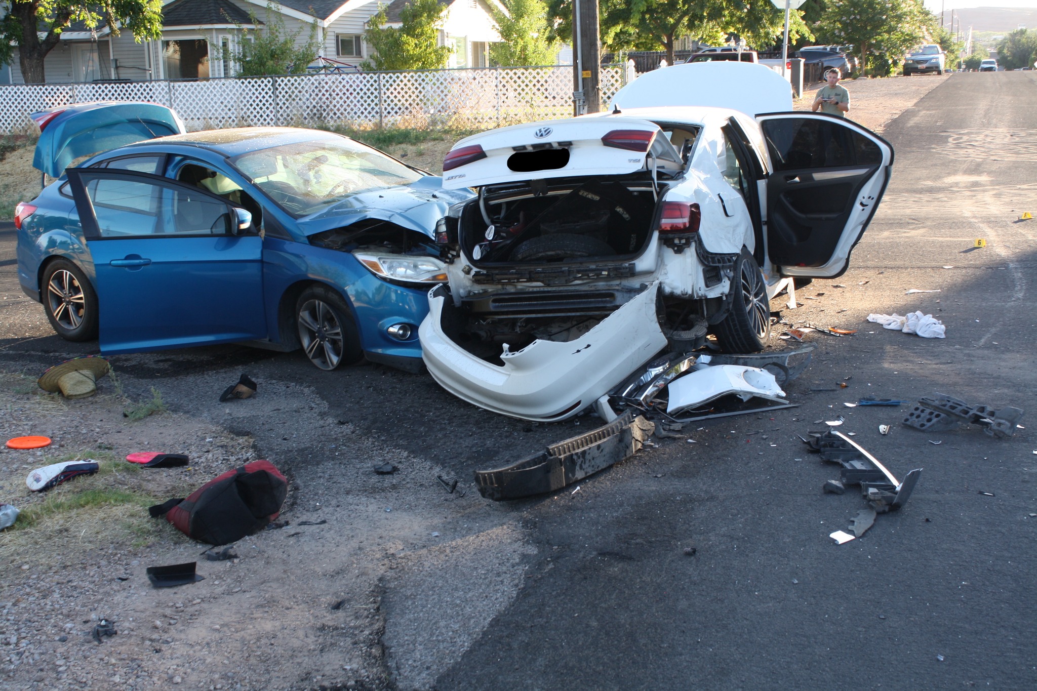 A man who police say was impaired and trying to text on his phone when he ran a stop sign and hit another vehicle, killing a 7-year-old boy, is facing numerous criminal charges. 