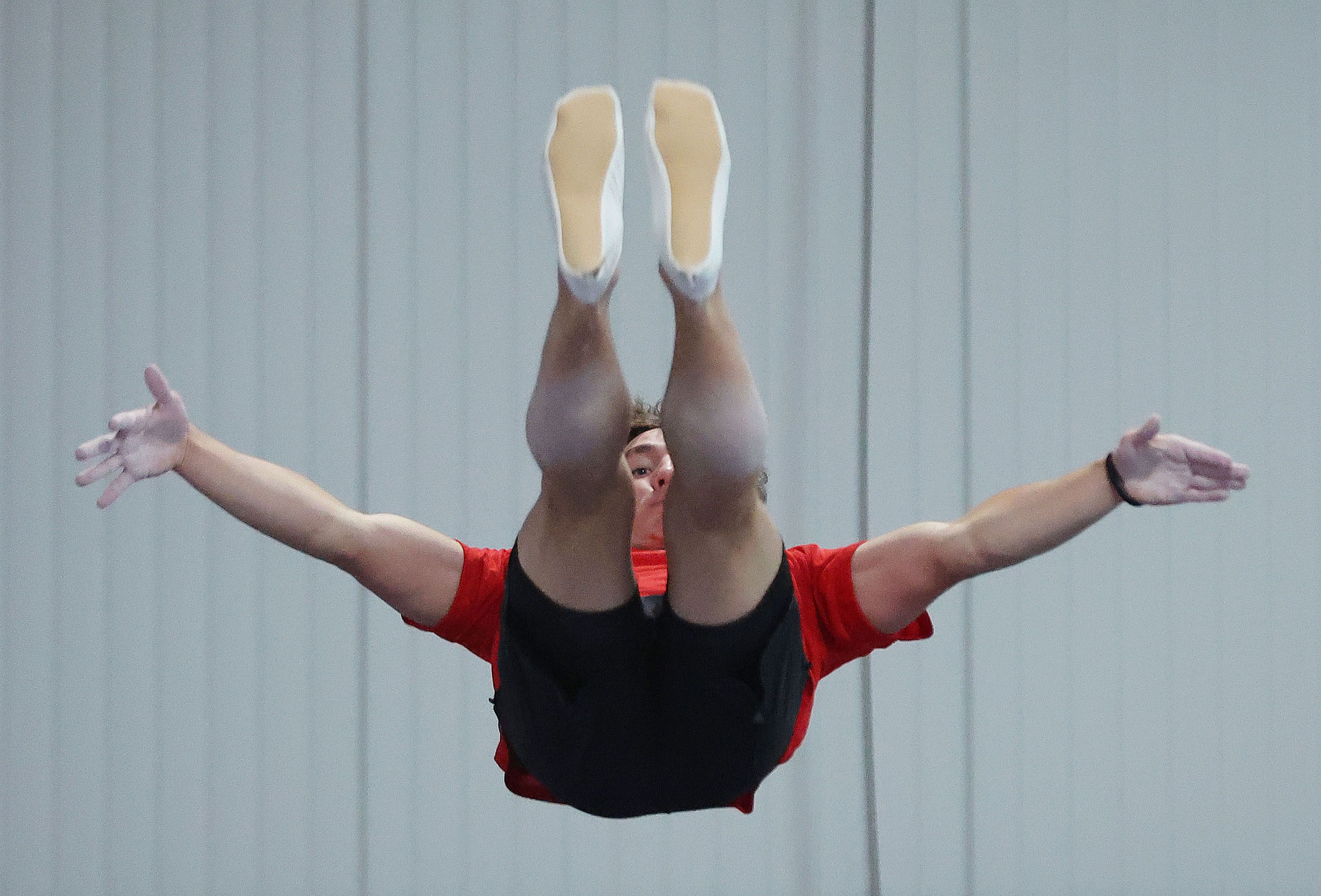 Simon Smith, of Springville, a gymnast representing Team USA for the upcoming Trampoline World Cup, works out in Orem on Thursday.
