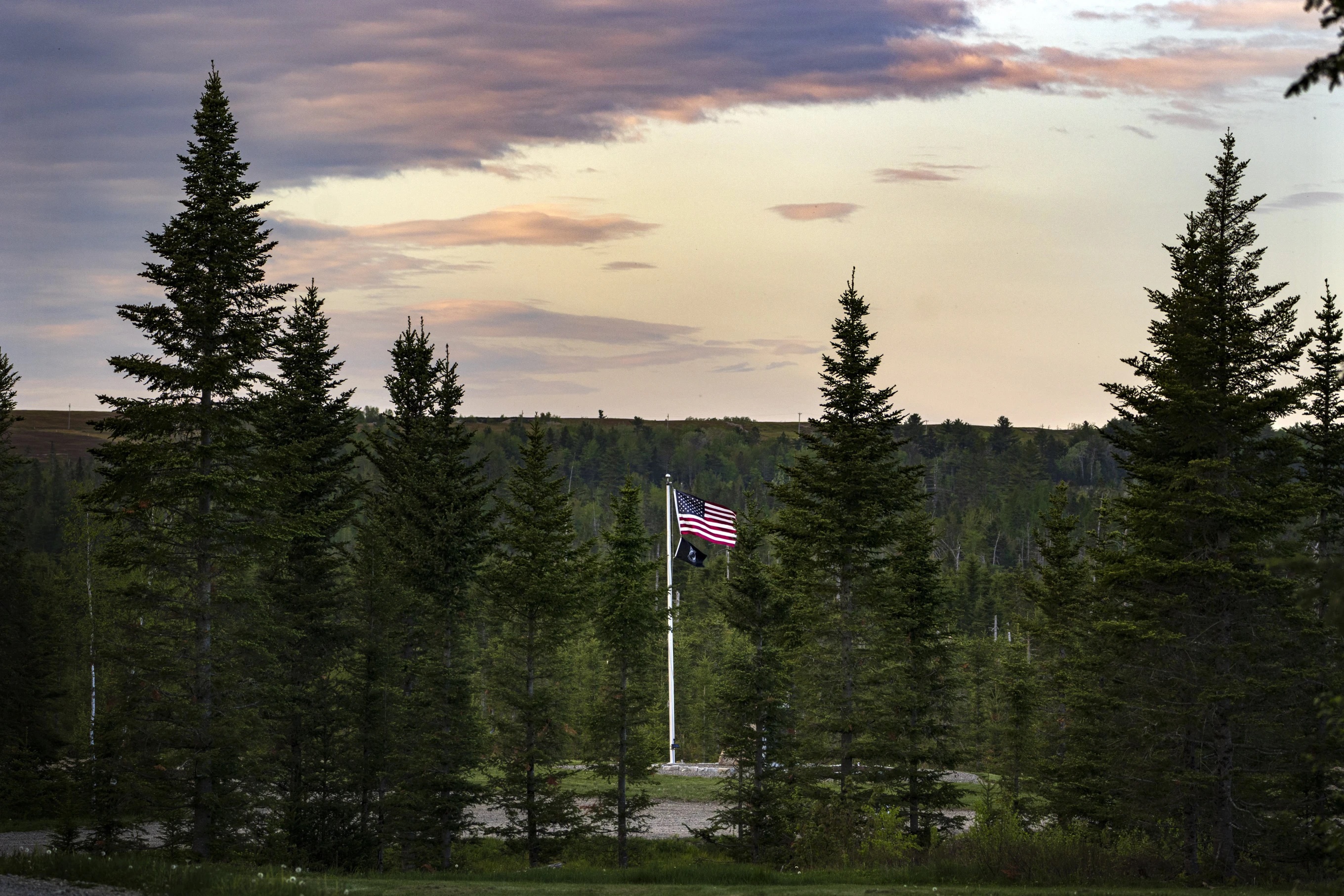 An U.S. flag flies at Patriot Park where a collection of monuments stand in tribute to veterans in Columbia Falls, Maine, May 27. The Worcester family hopes to build a $1 billion world’s tallest flagpole theme park nearby.