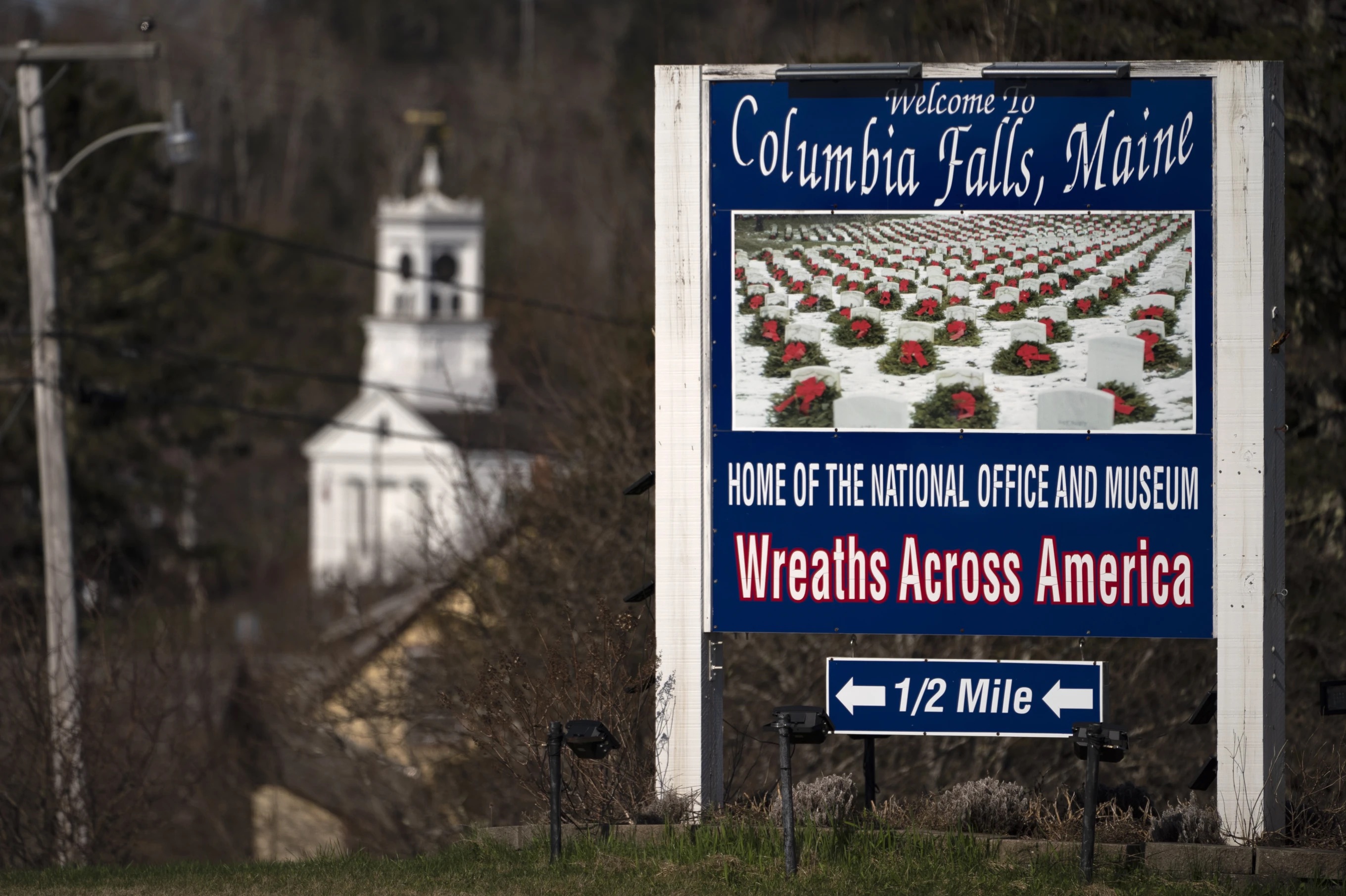 A sign welcomes visitors to Columbia Falls, Maine April 28.