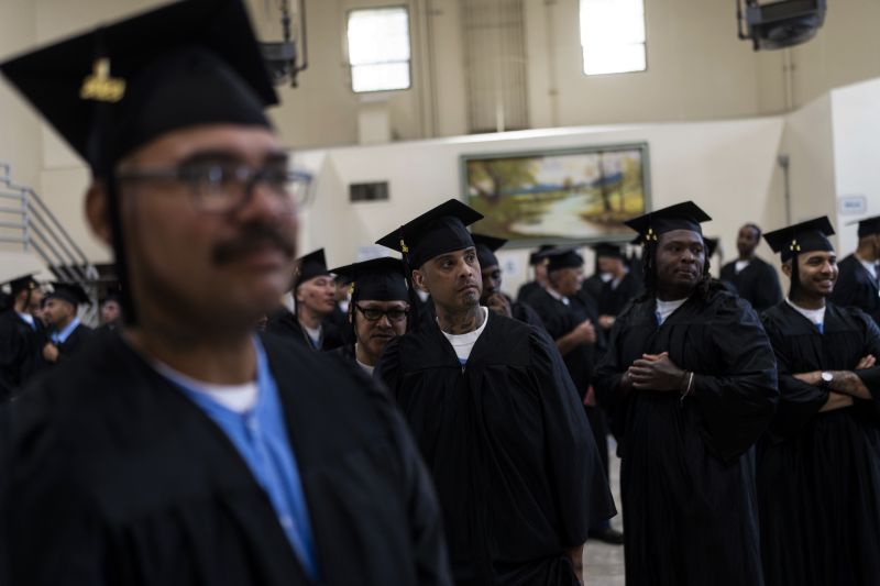 Incarcerated graduates, who finished various educational and vocational programs in prison, wait for the start of their graduation ceremony at Folsom State Prison in Folsom, Calif. on May 25, 2023. - Jae C. Hong, AP Photo