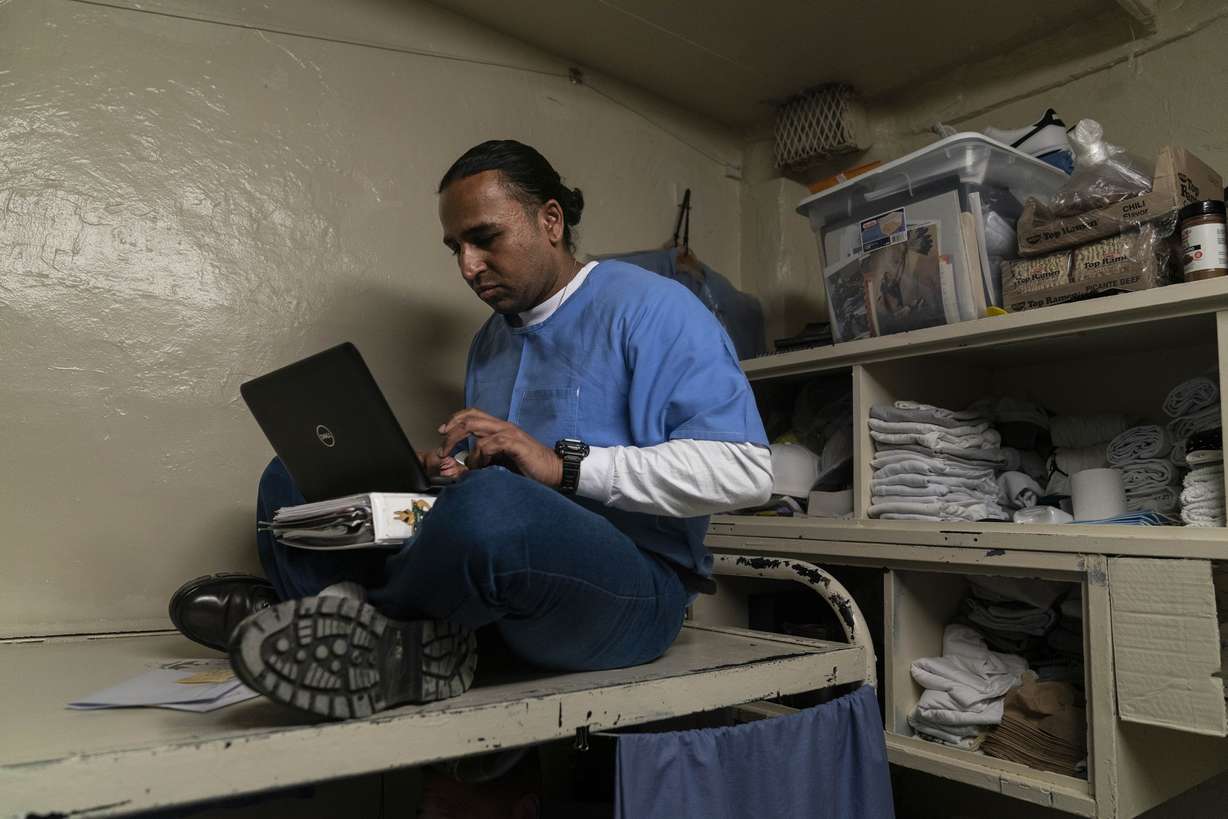 Gerald Massey, an incarcerated student majoring communications through the Transforming Outcomes Project at Sacramento State (TOPSS), studies in his cell at Folsom State Prison in Folsom, Calif. on May 3, 2023.