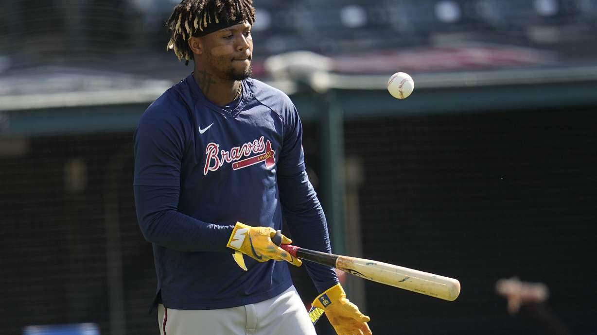 Atlanta Braves' Ronald Acuna Jr. bounces the ball on his bat during batting practice before a baseball game against the Cleveland Guardians, Monday, July 3, 2023, in Cleveland.