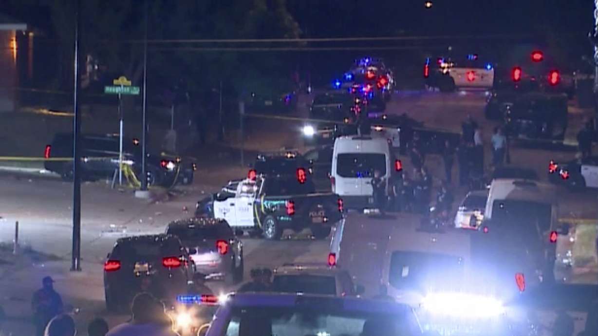 Police arrive on the scene of a deadly shooting on Monday in Forth Worth, Texas. Authorities say gunfire erupted following a local festival in the Como neighborhood in the city's southwest.
