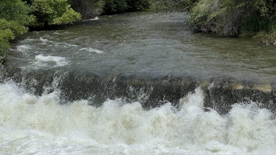 Water gushes over a ledge in the Provo River with historic levels of runoff. Provo city is looking to store excess water in underground aquifers to preserve it for future droughts and for generations to come. 