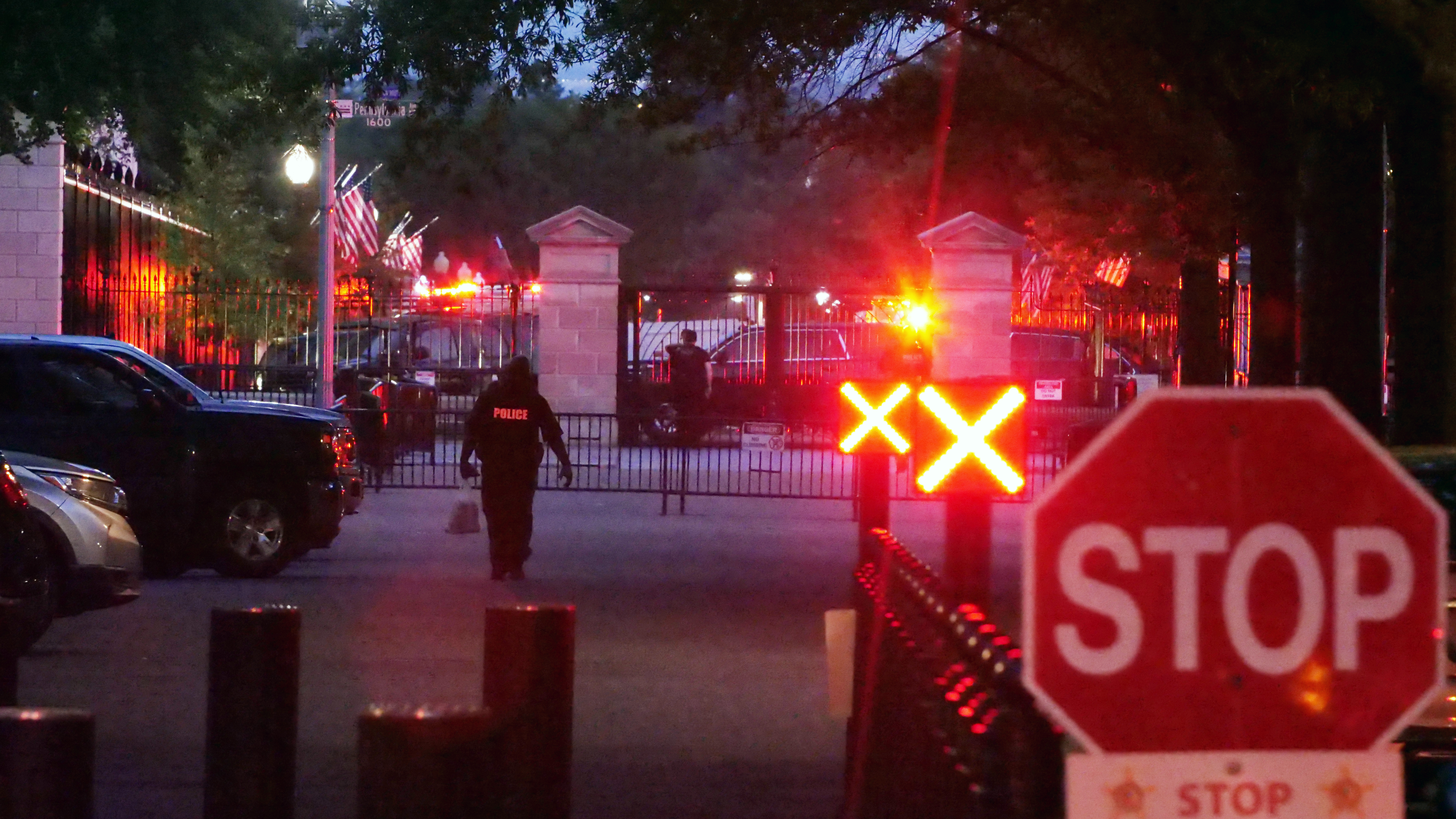 Police are seen outside the White House grounds, Sunday night in Washington. The White House was briefly evacuated Sunday evening while President Joe Biden was at Camp David after the Secret Service discovered the suspicious powder in a common area of the West Wing, and a preliminary test showed the substance was cocaine, two law enforcement officials said Tuesday.