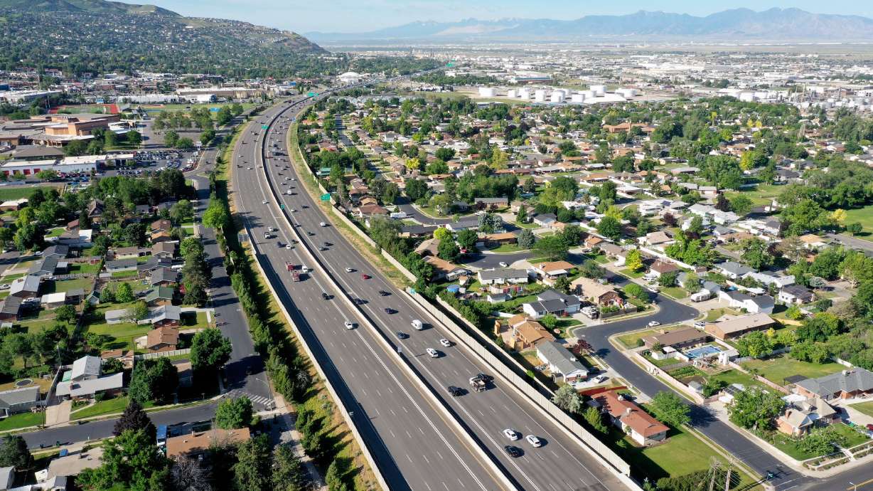 Homes are pictured along I-15 in Woods Cross on June 16. Residential, commercial and historical properties could be impacted by a widening of I-15.