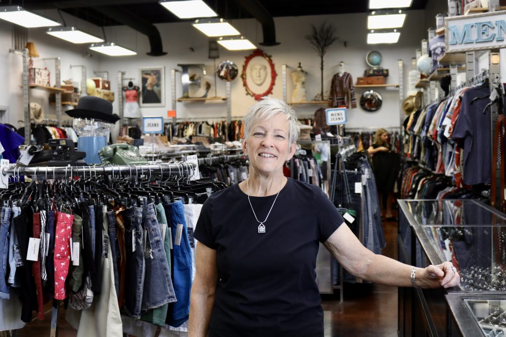 Coyote Exchange owner April Goodspeed smiles for a photo inside her store in St. George, Utah, June 19. Goodspeed's clothing resale store has been lowering pollution and waste for 14 years.