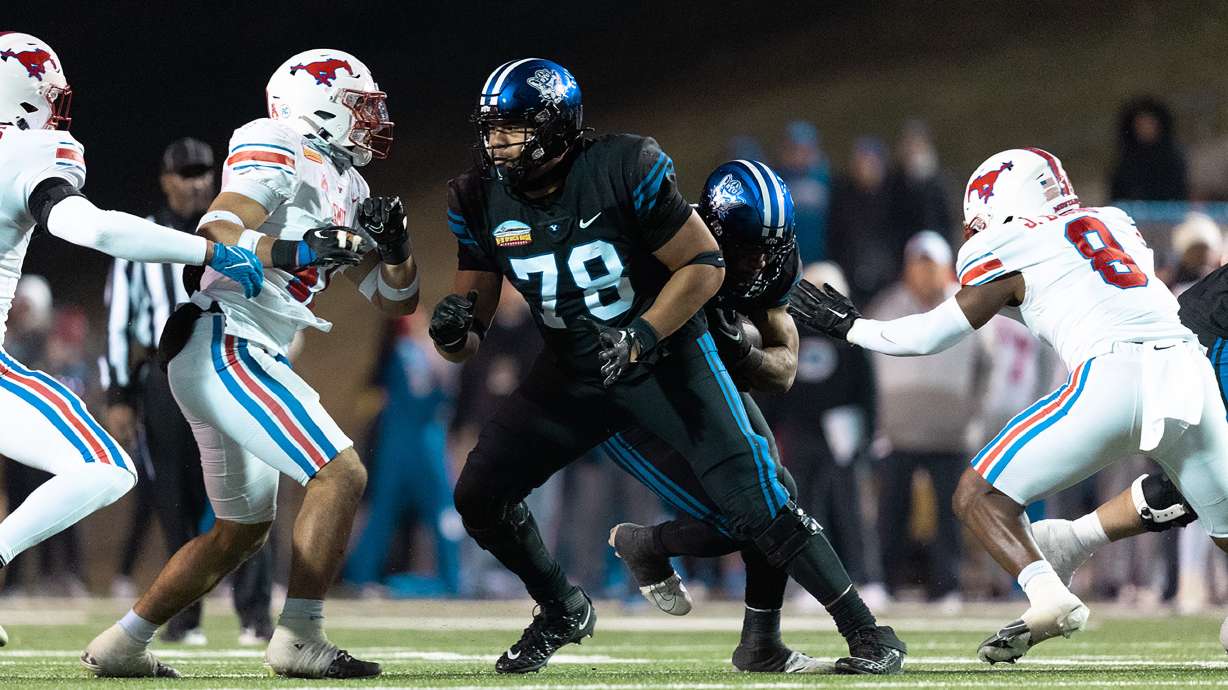 BYU offensive tackle Kingsley Suamataia, shown here in team's New Mexico Bowl win over SMU in 2022, was named to the All-Big 12 preseason first team in the Cougars' first year in the conference.