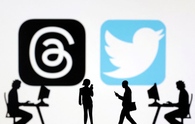 Meta Threads and Twitter app logos are seen in this illustration Thursday. Twitter is threatening Meta with a lawsuit after the blockbuster launch of Meta's new Twitter rival, Threads. 