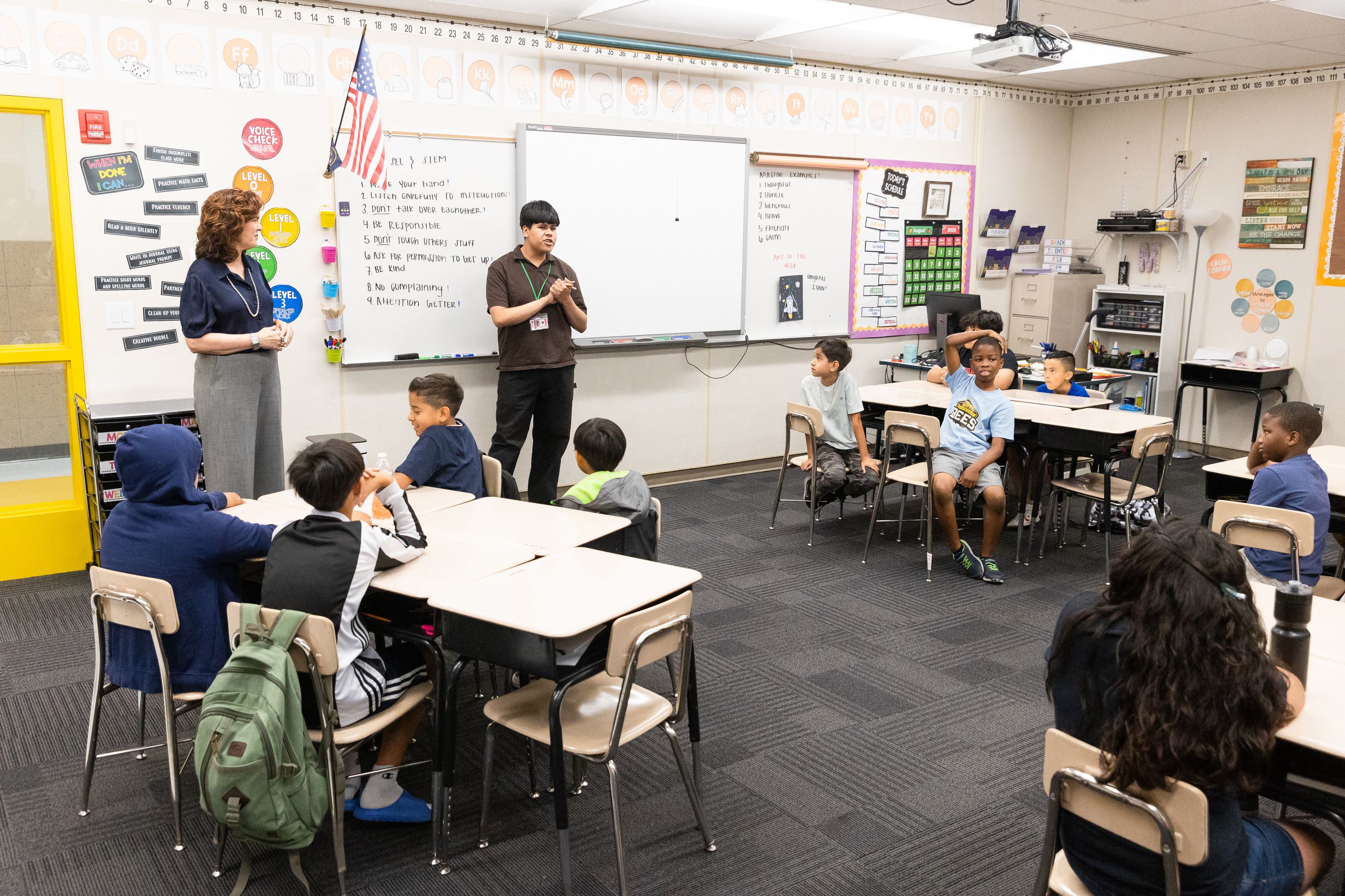 Elizabeth Grant, new superintendent of the Salt Lake City School District, left, and Josse Mendoza, group leader, give instructions to fifth and sixth graders in their summer school class at North Star Elementary School in Salt Lake City on Thursday.