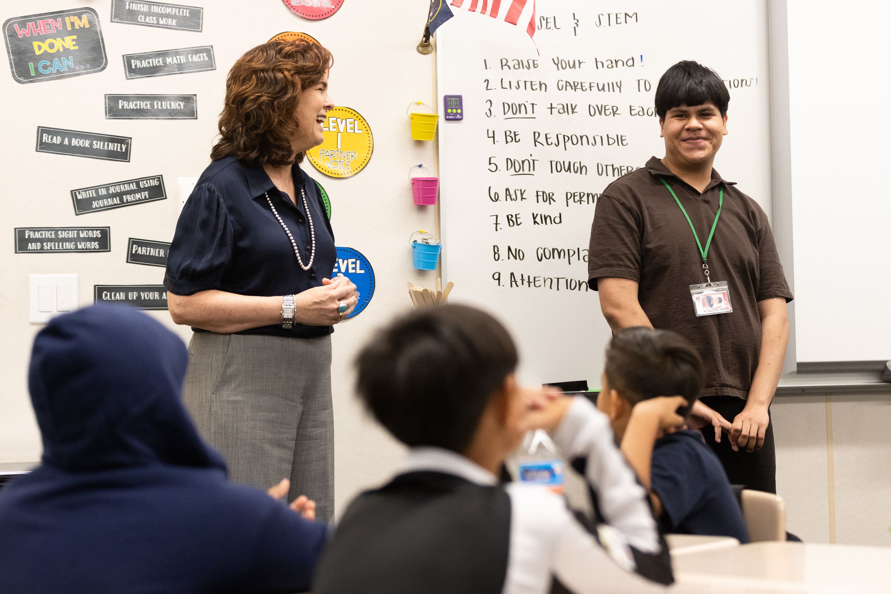 Elizabeth Grant, new superintendent of the Salt Lake City School District, left, and Josse Mendoza, group leader, give instructions to fifth and sixth graders in their summer school class at North Star Elementary School in Salt Lake City on Thursday.