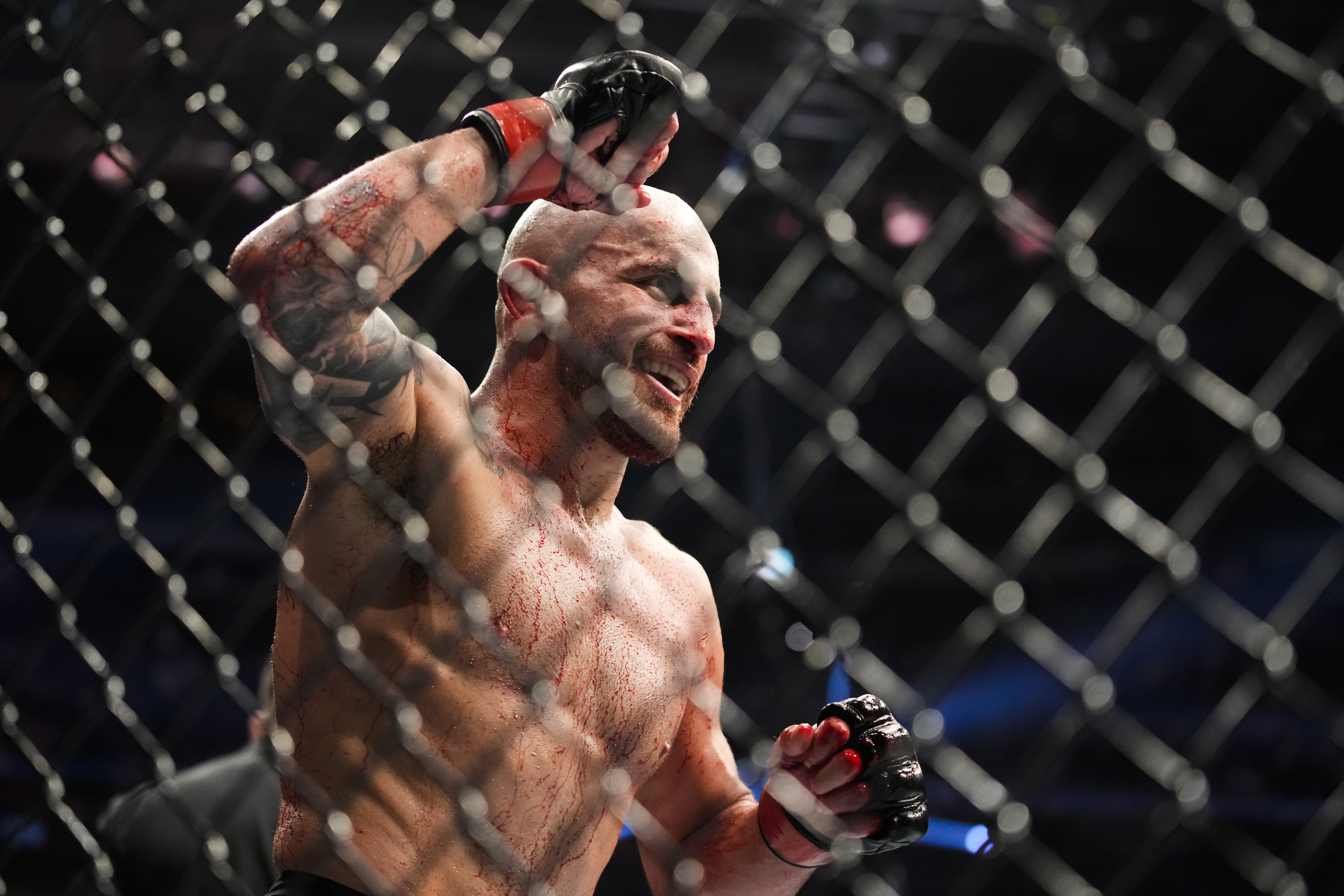 FILE - Alexander Volkanovski reacts after winning a featherweight title bout against Max Holloway during the UFC 276 mixed martial arts event, July 2, 2022, in Las Vegas. Volkanovski will face interim champ Yair Rodriguez in UFC 290 in Las Vegas on Saturday, July 8, 2023. 