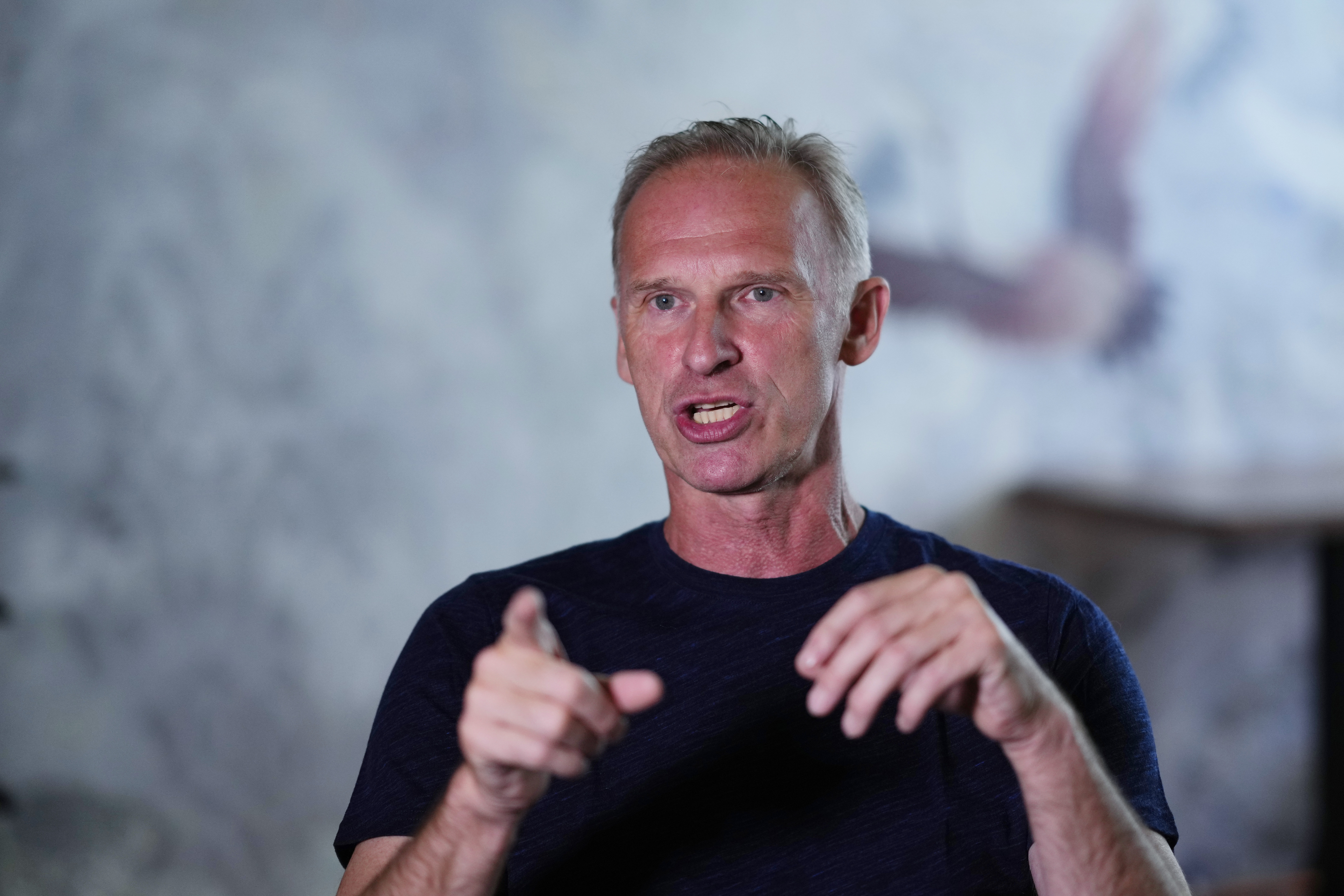 Former NHL goalkeeper Dominik Hasek gestures during an interview with The Associated Press in Prague, Czech Republic, Wednesday, June 28, 2023. The NHL great has been a prominent and vocal critic of the International Olympic Committee's recommendation that Russians and Belarusians could compete in international competitions after being approved as neutrals. 