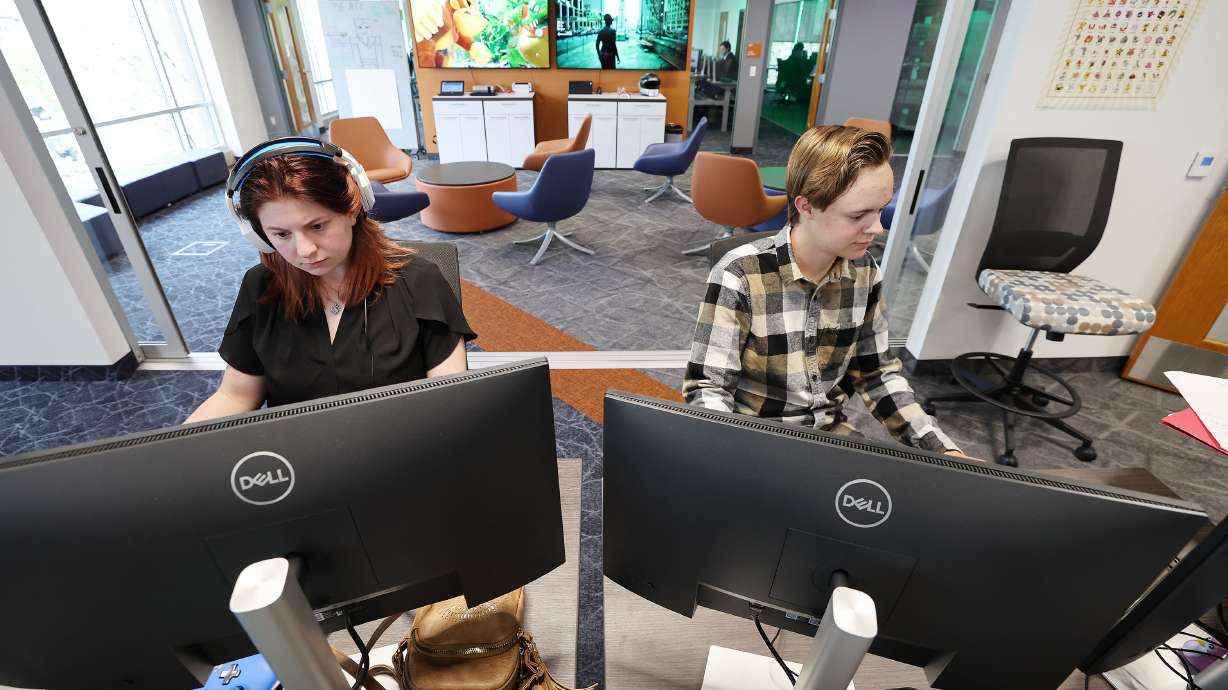 Northridge High's Kendra Connerly and Tate McRoberts study software engineering at the Davis Catalyst Center in Kaysville on April 26, 2022. The Davis District on Thursday formalized a concurrent enrollment agreement with Davis Technical College.