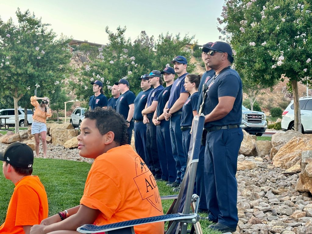 Members of the Washington Fire Department at the candlelight vigil for Ace Butterfus, Washington, Washington County, Wednesday.