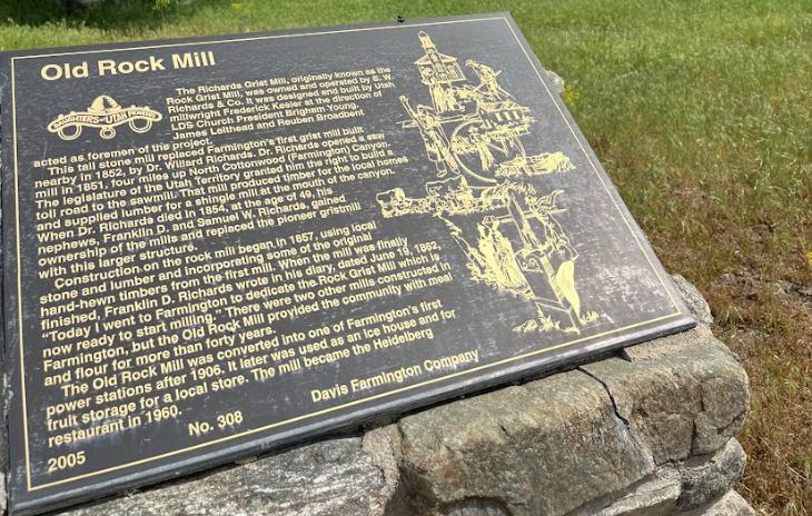 A historical plaque describing the history of the Old Rock Mill, that sits in the foothills of Farmington. The mill was recently purchased by the city in an effort to preserve its history and setting.