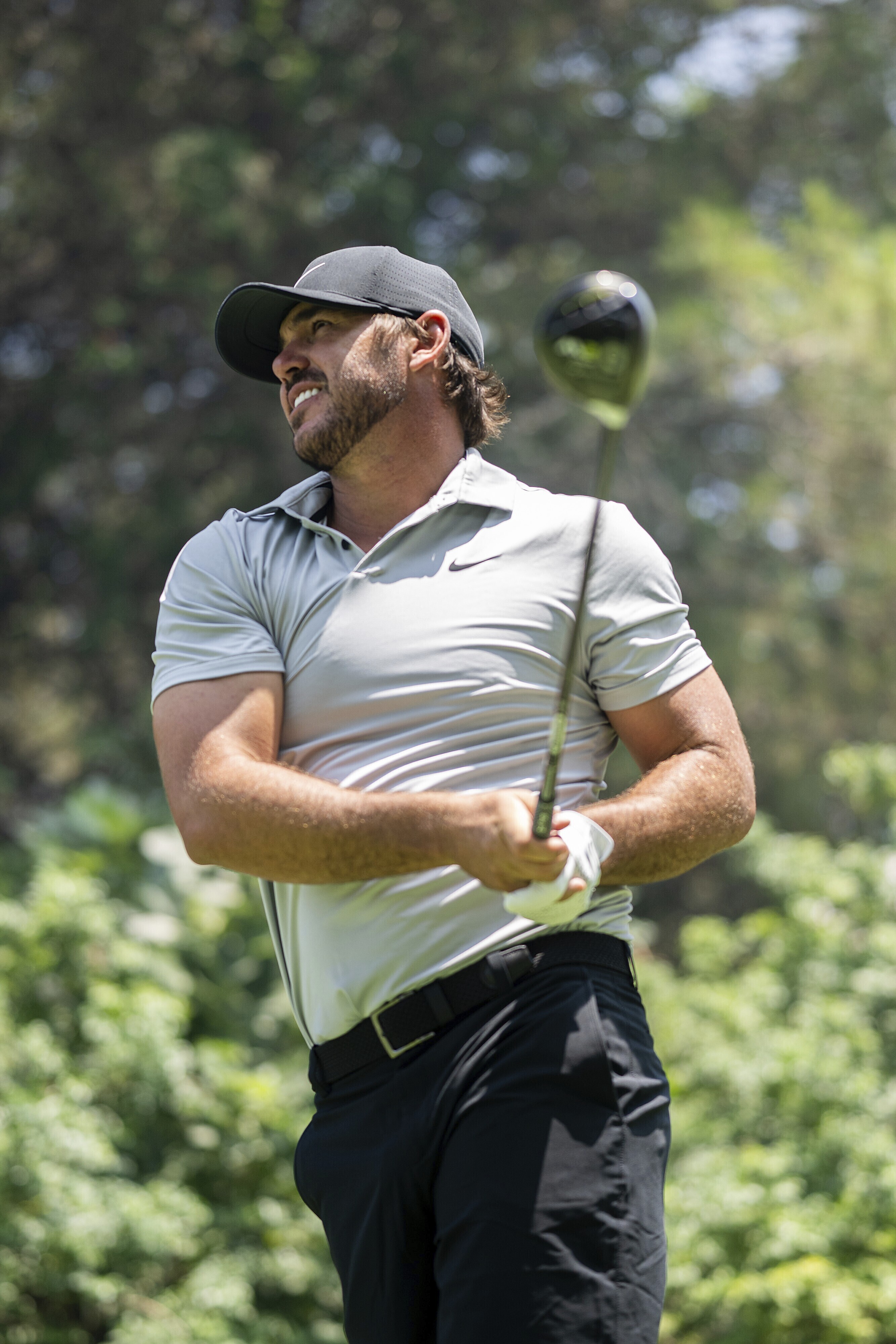 Brooks Koepka watches his shot from the 16th tee during the second round of LIV Golf-Valderrama golf tournament Saturday, July 1, 2023, in Sotogrande, Spain. 