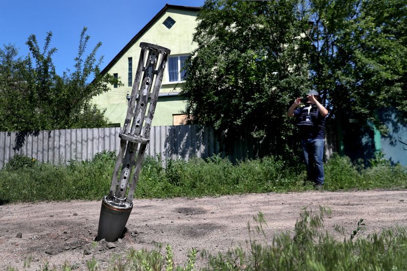 An emptied cluster munition container is seen stuck in the ground amid Russia's attack on Ukraine, on the outskirts of Kharkiv, Ukraine, on June 10, 2022. Canada is against the use of cluster munitions that the U.S. has promised to give Ukraine.